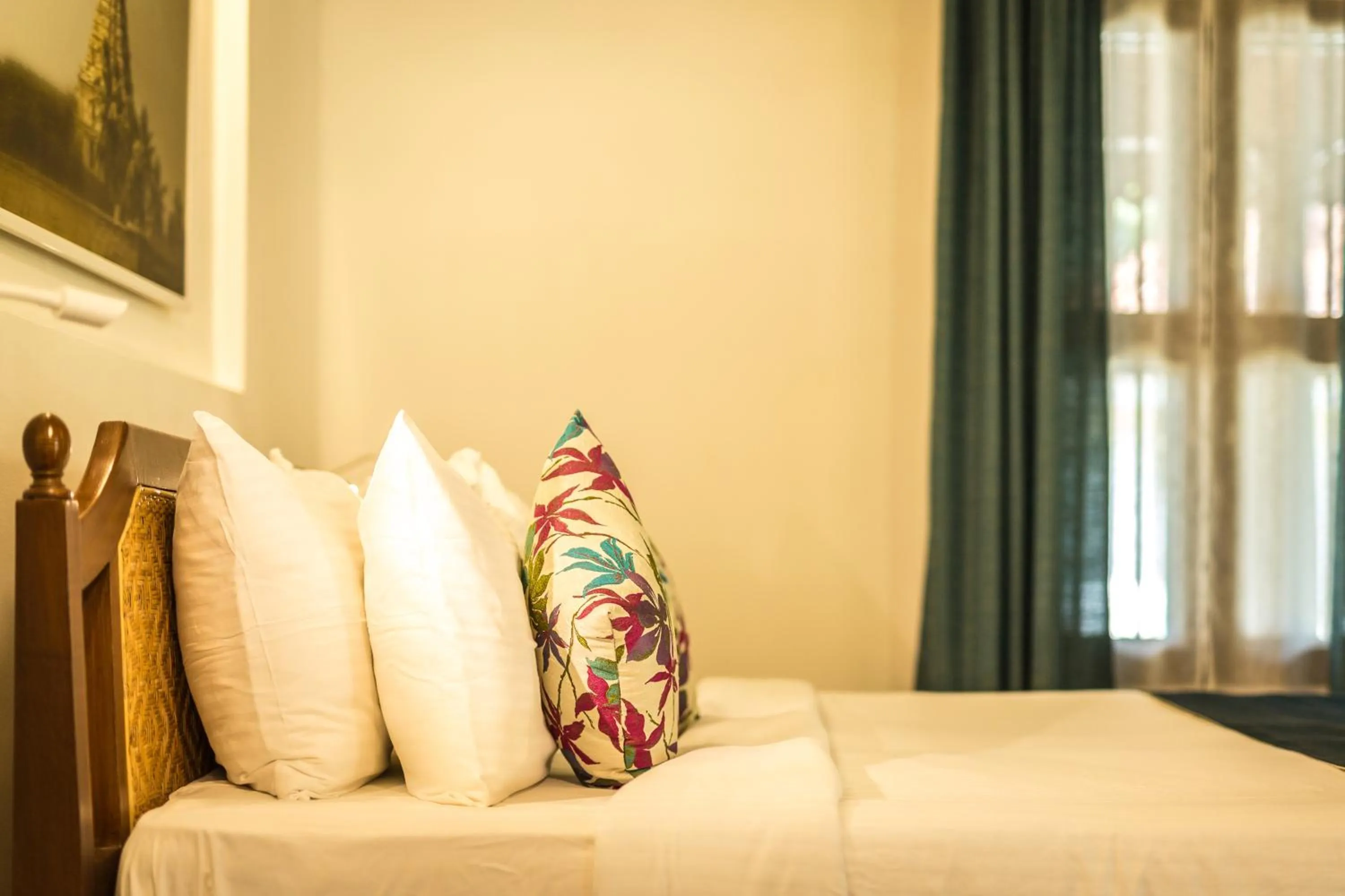 Bed in Mantra Koodam Kumbakonam - A CGH Earth Experience