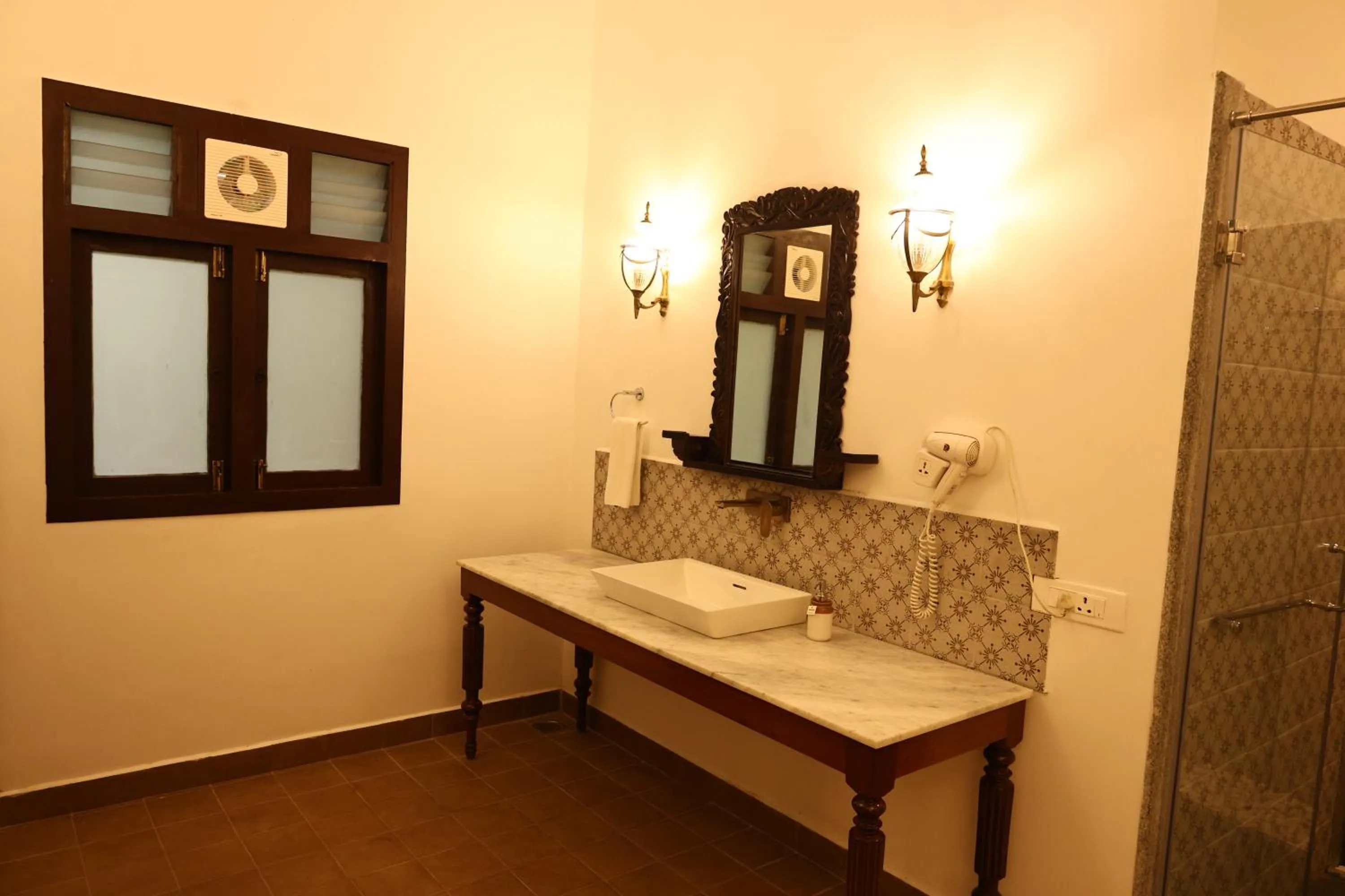 Bathroom in Mantra Koodam Kumbakonam - A CGH Earth Experience