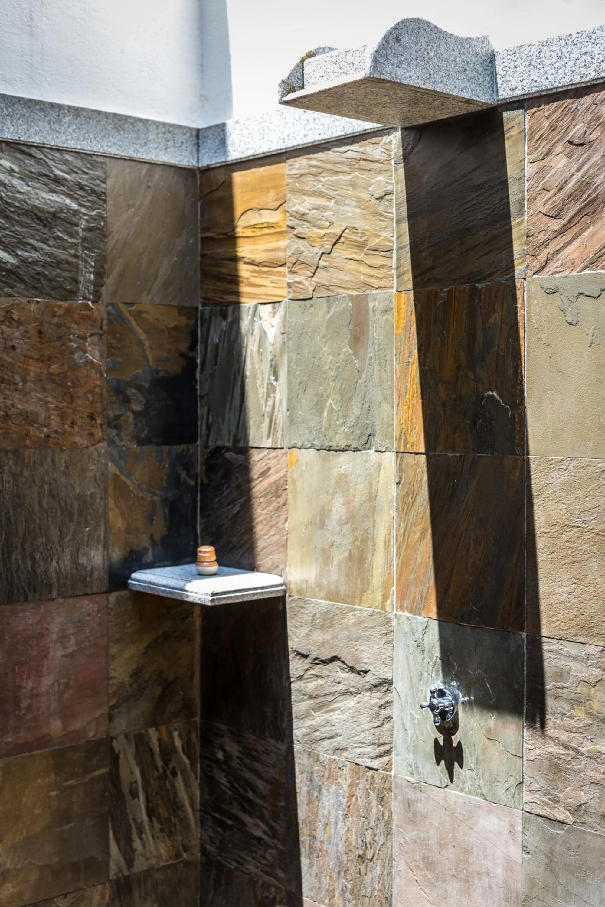 Shower in Mantra Koodam Kumbakonam - A CGH Earth Experience