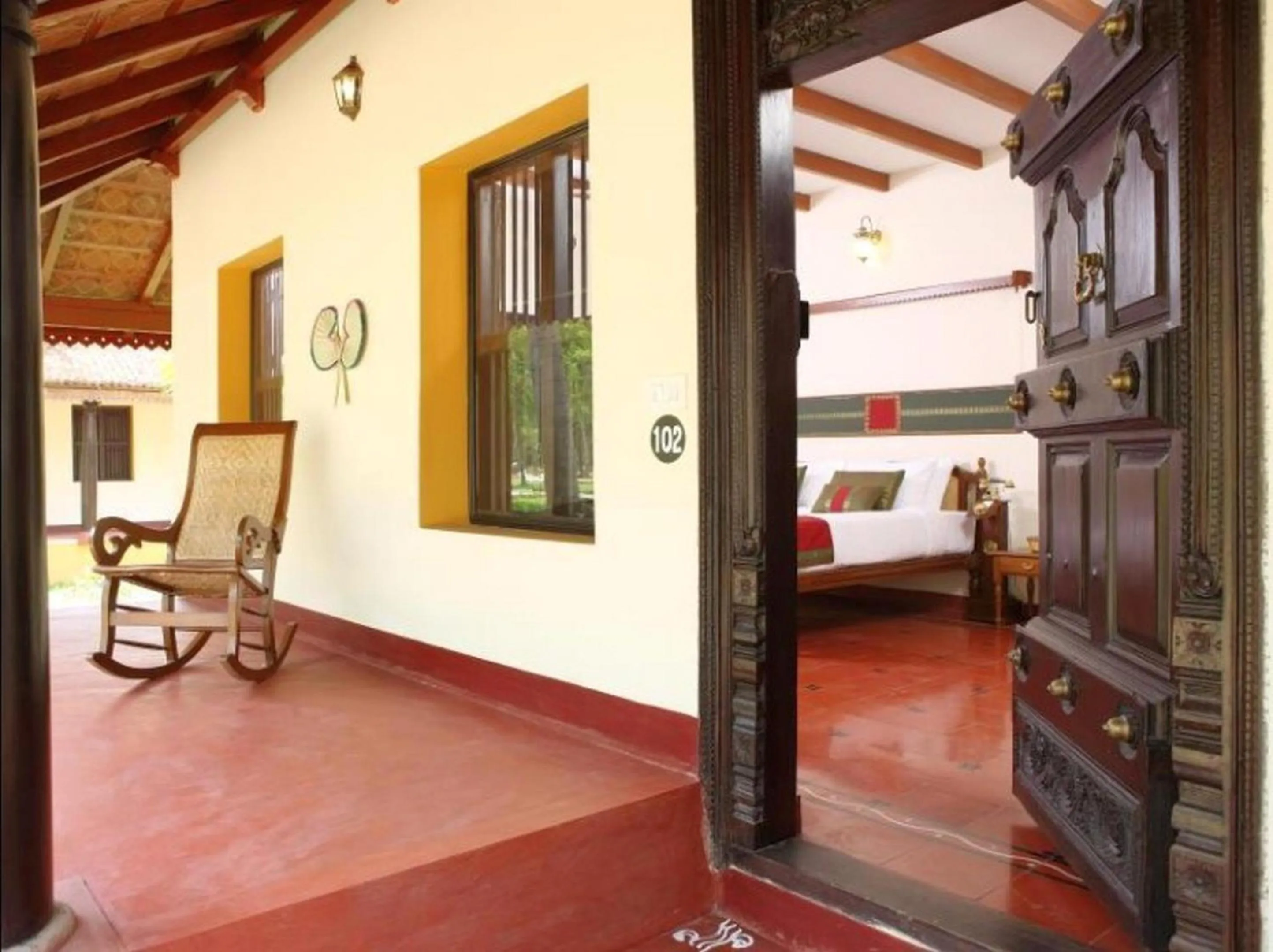 Bed in Mantra Koodam Kumbakonam - A CGH Earth Experience