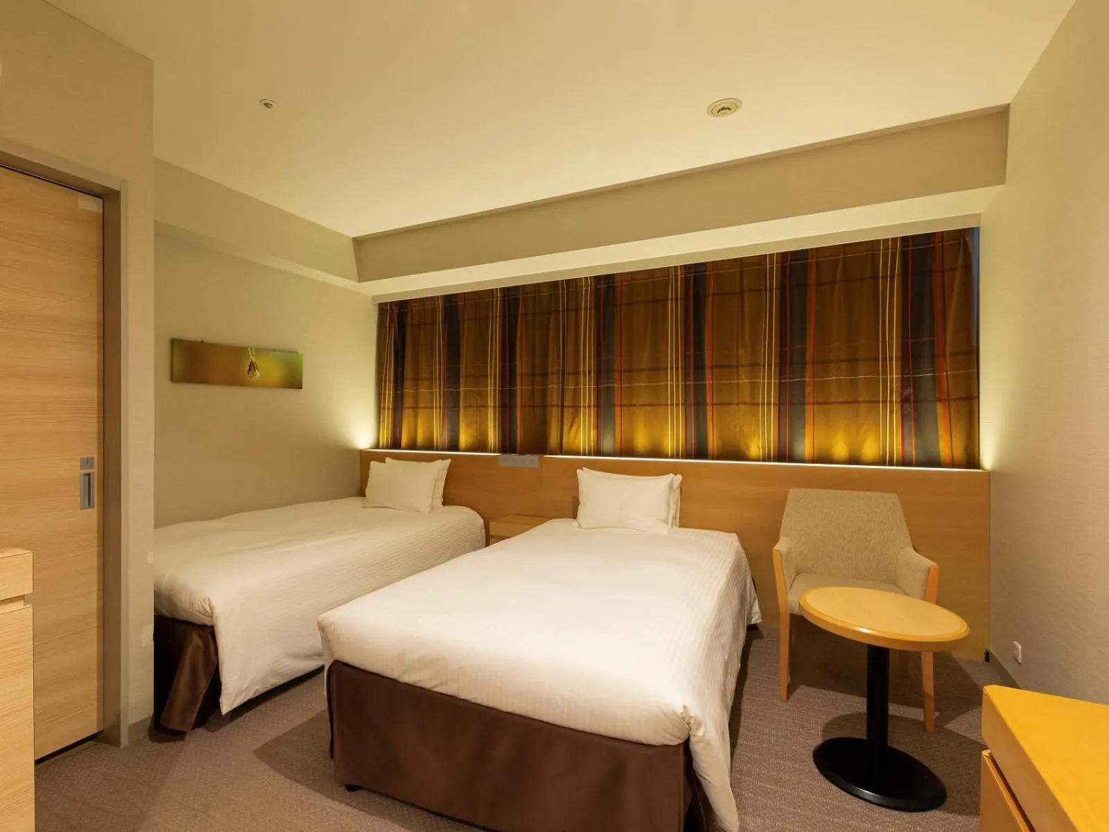 Bed in Hotel Keihan Kyobashi Grande