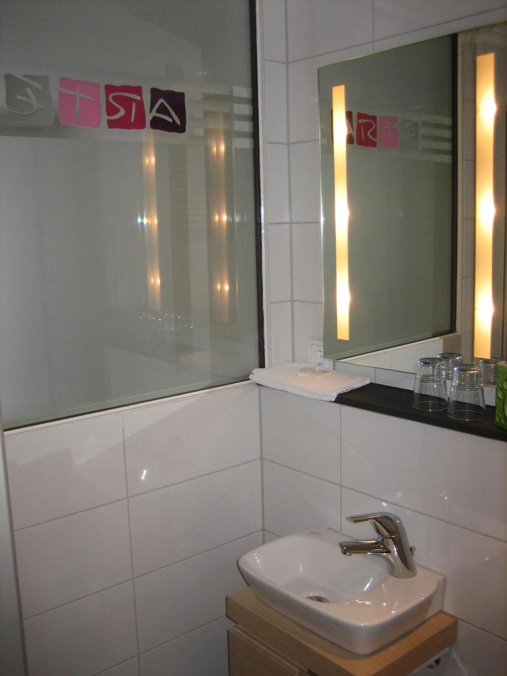 Bathroom in RheinHotel ARTE