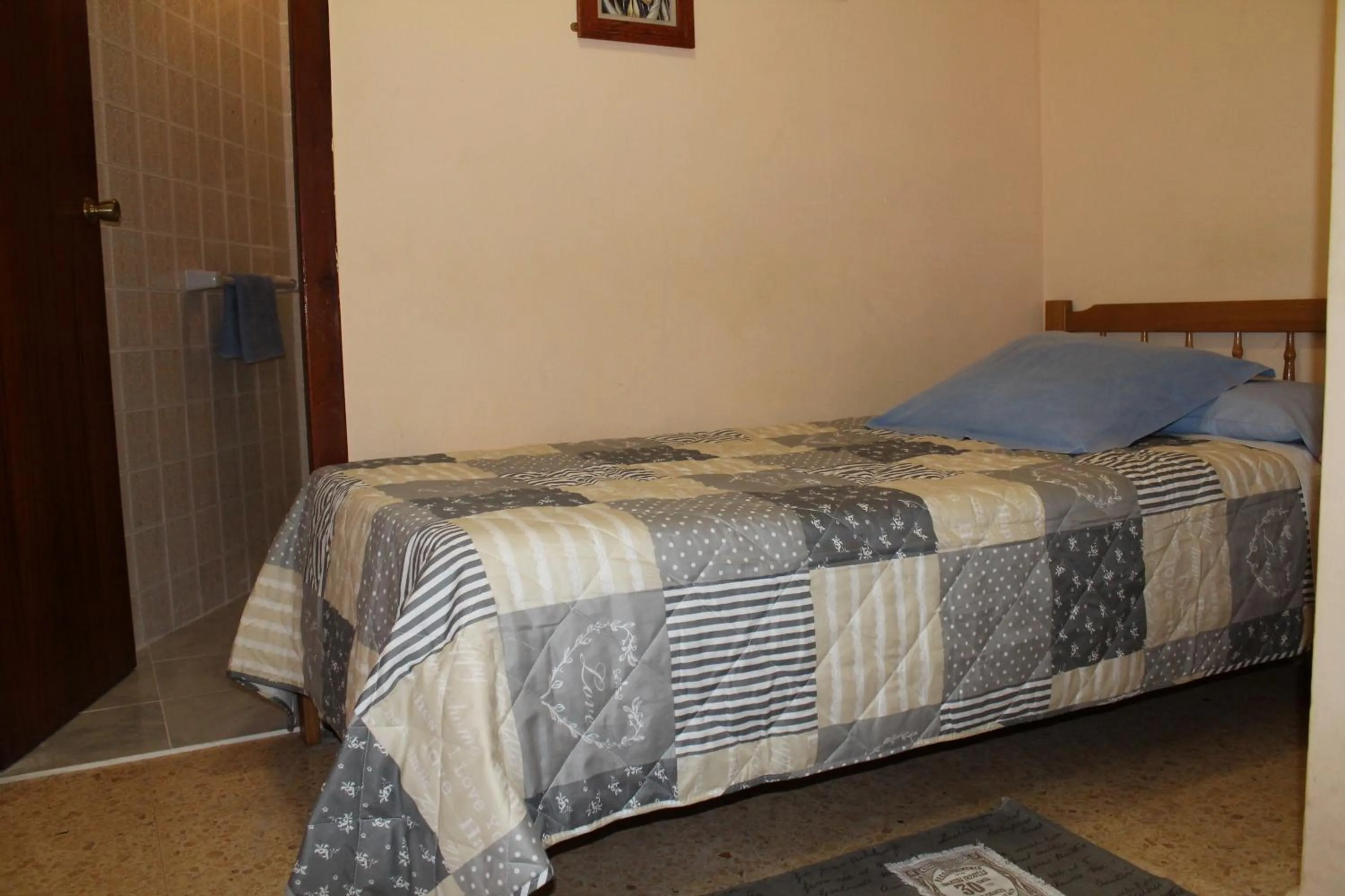 Bed in Pension El Parque