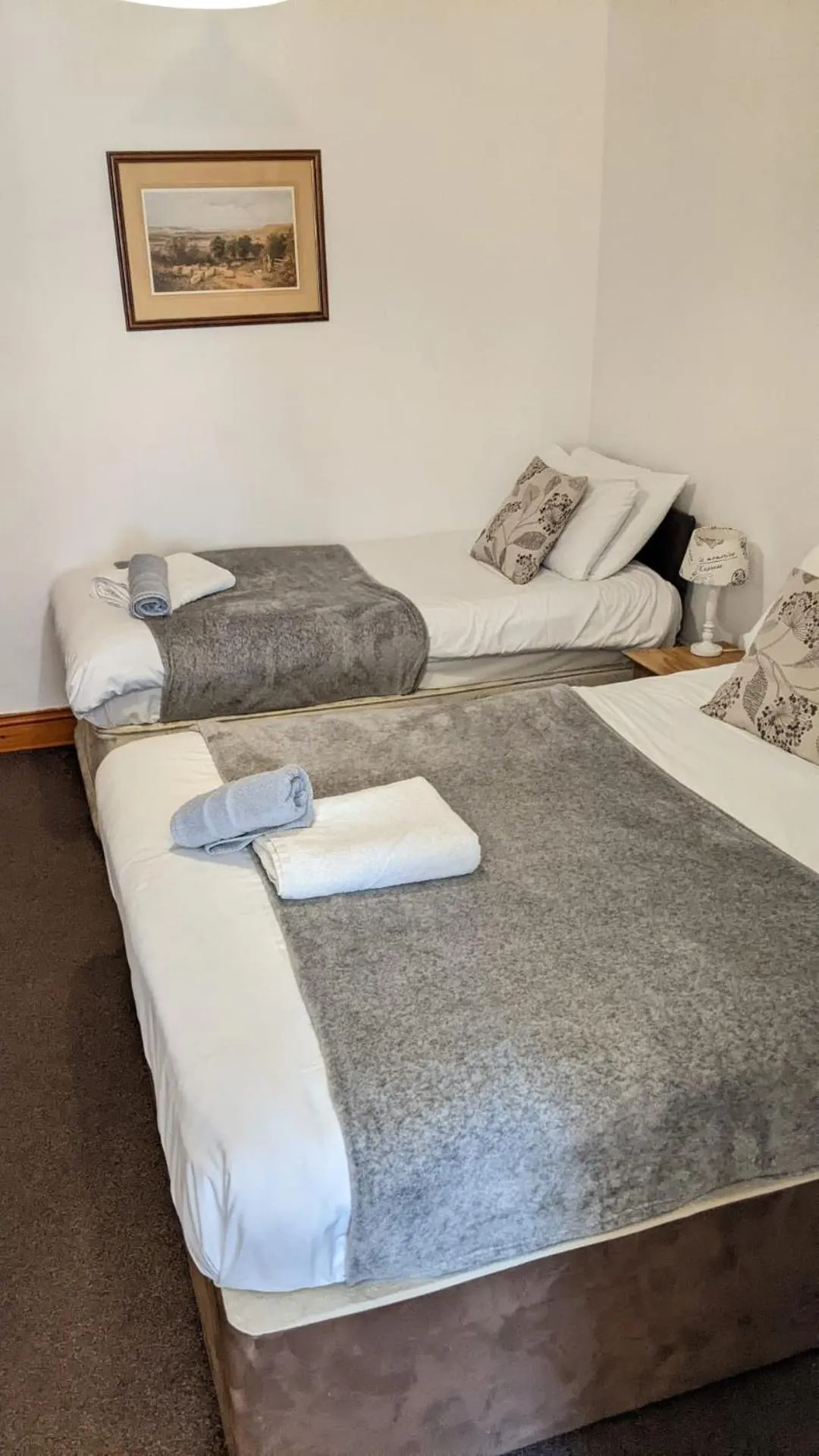 Bed in Old Palace Guest House