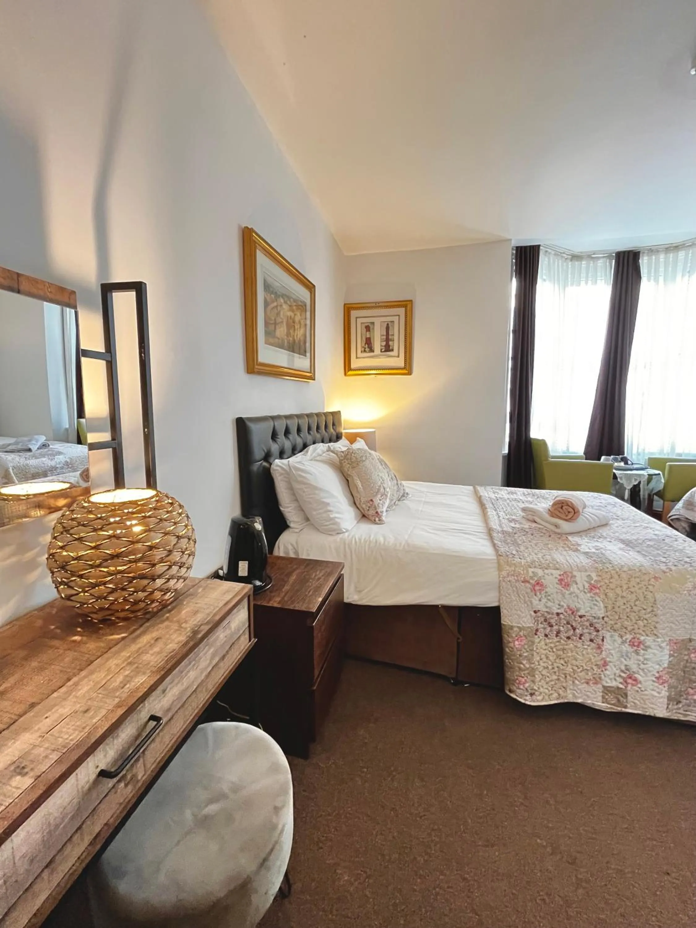 Bed in Old Palace Guest House