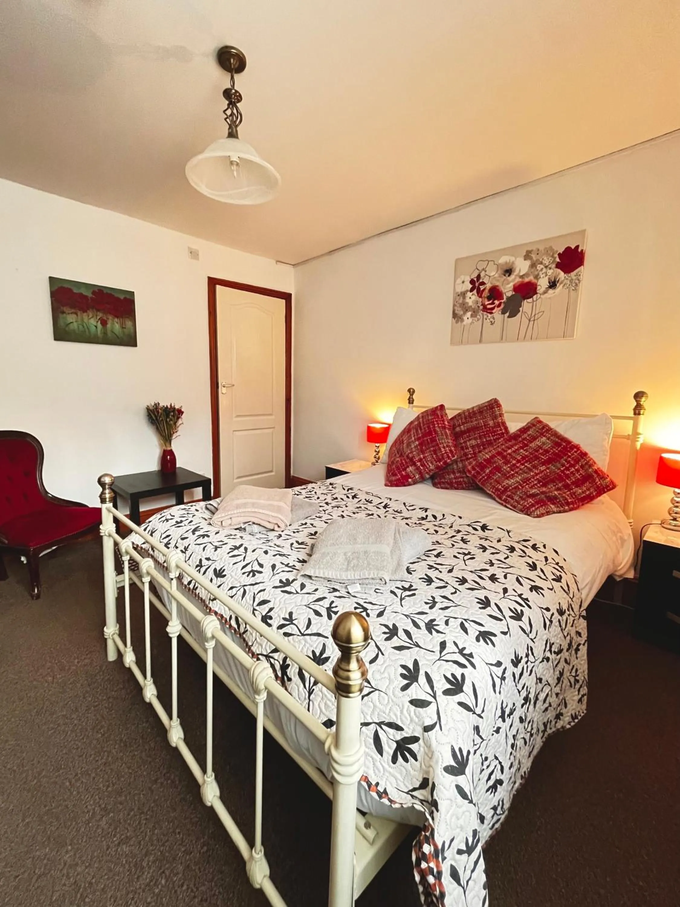 Bed in Old Palace Guest House