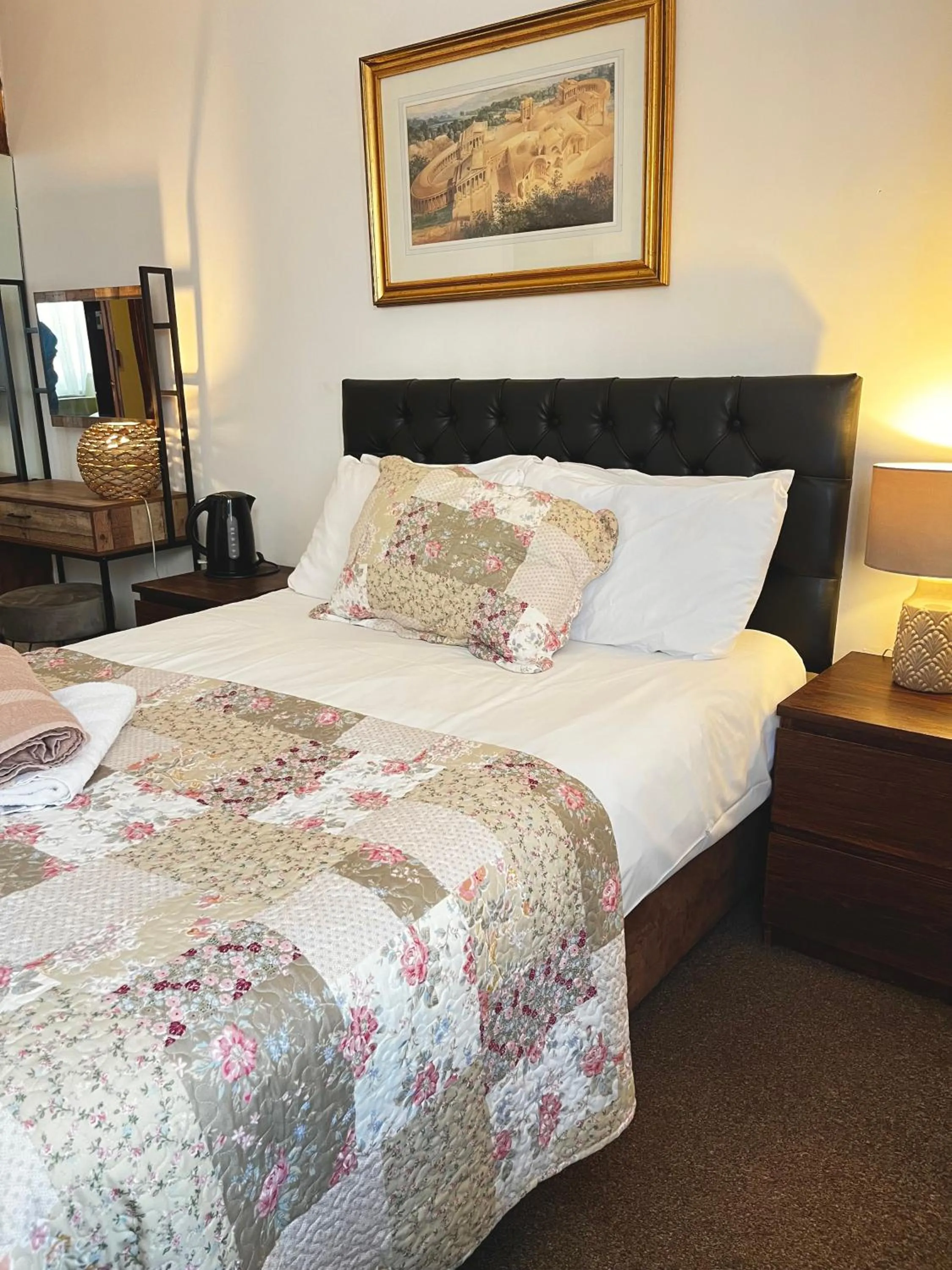 Bed in Old Palace Guest House