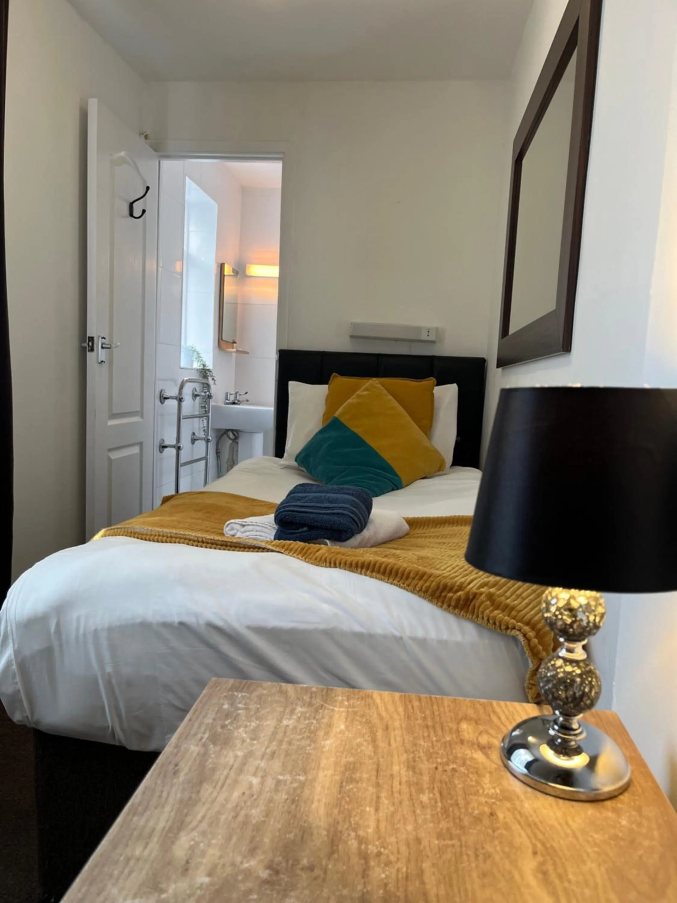 Bed in Old Palace Guest House