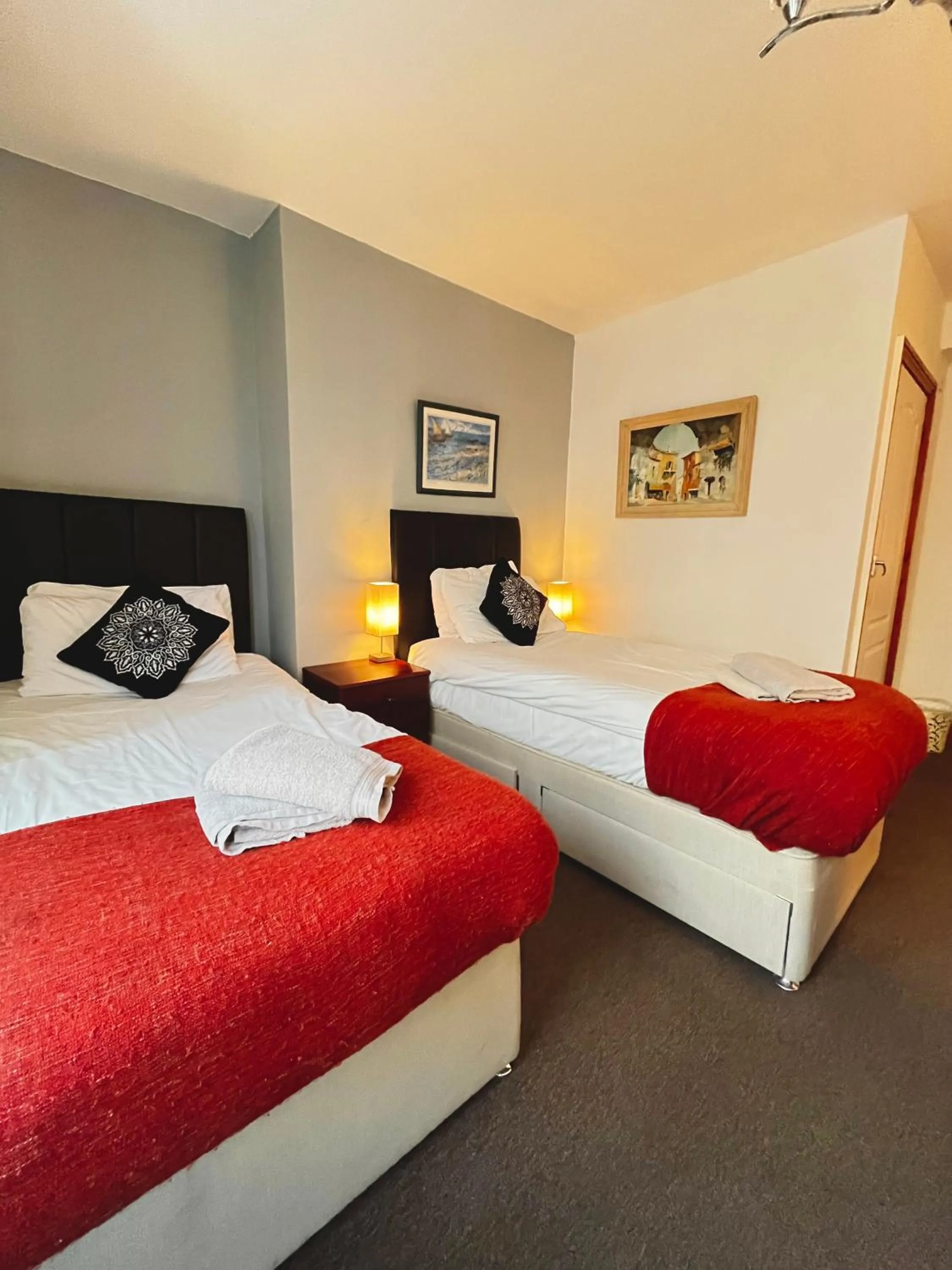 Bed in Old Palace Guest House