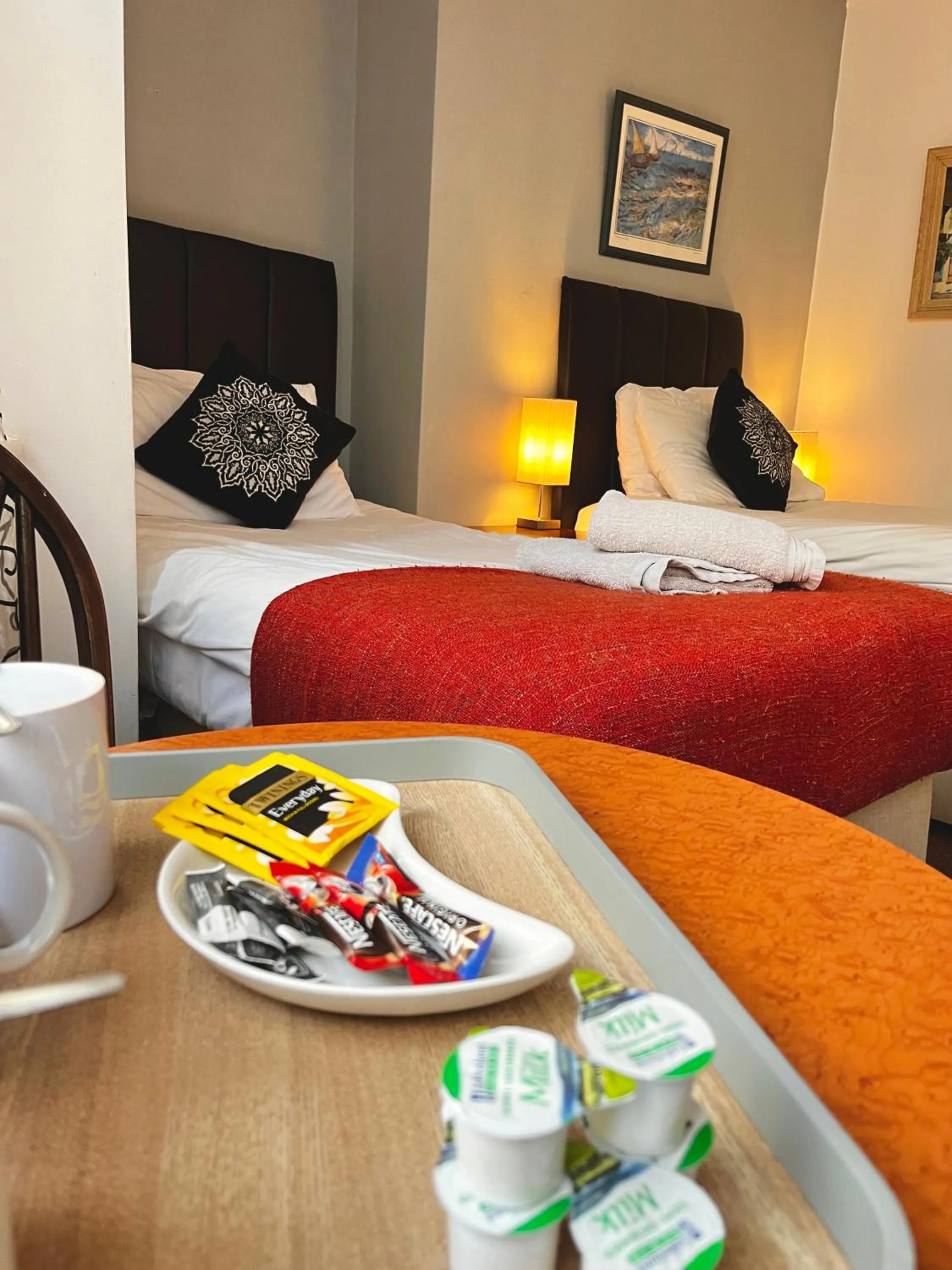 Bed in Old Palace Guest House