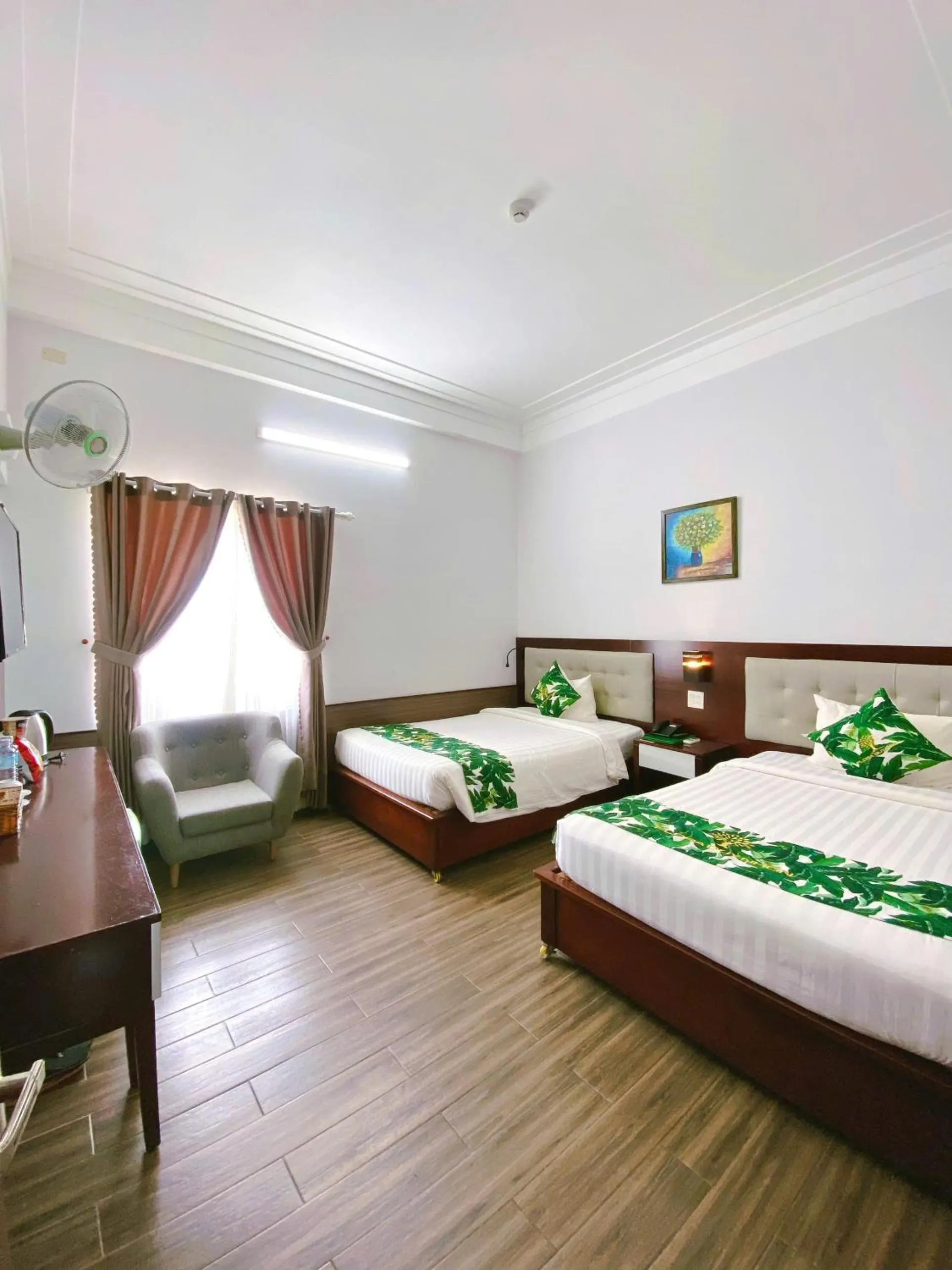 Bed in Flora Quy Nhon Hotel