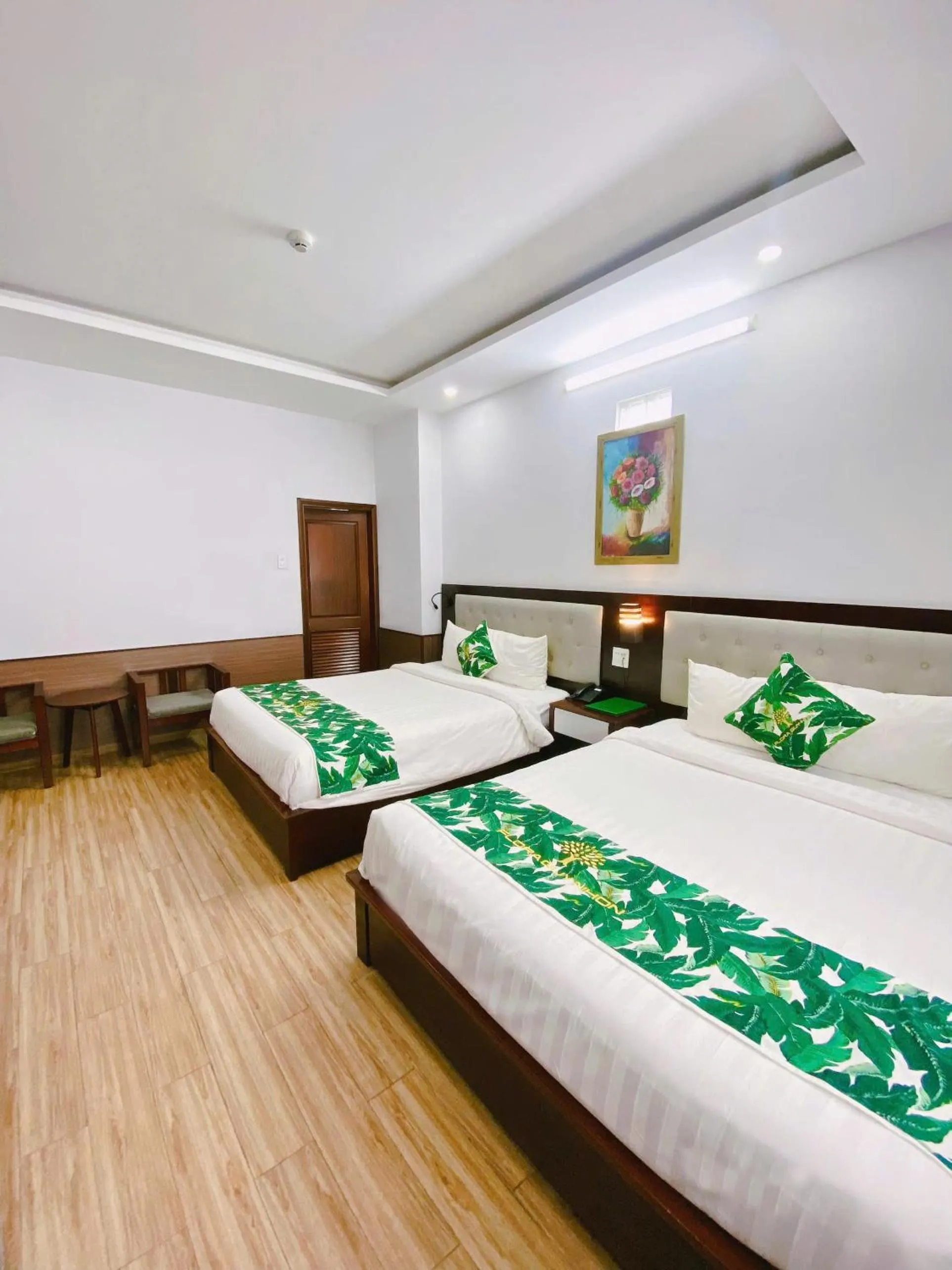 Bed in Flora Quy Nhon Hotel