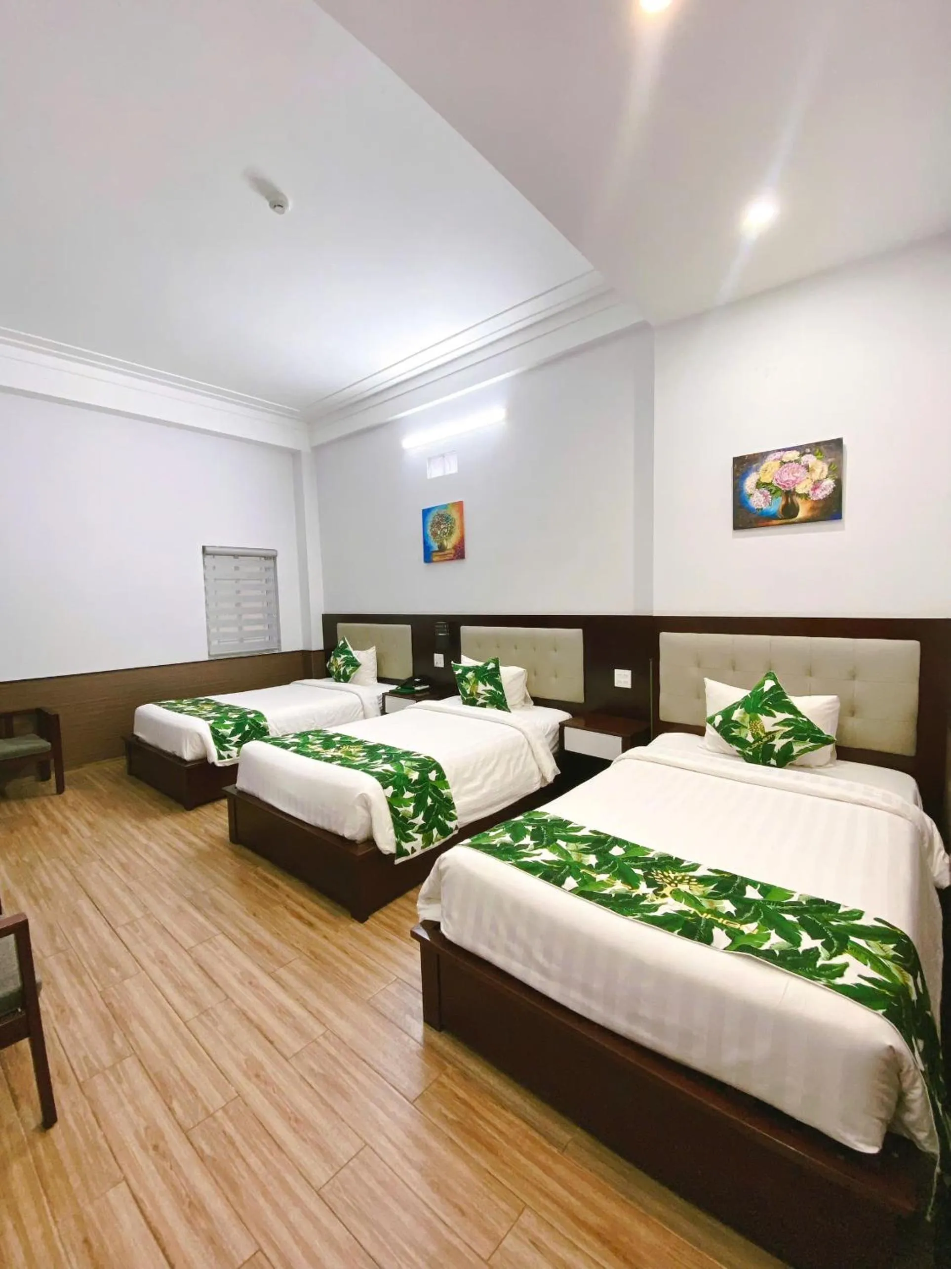 Bed in Flora Quy Nhon Hotel