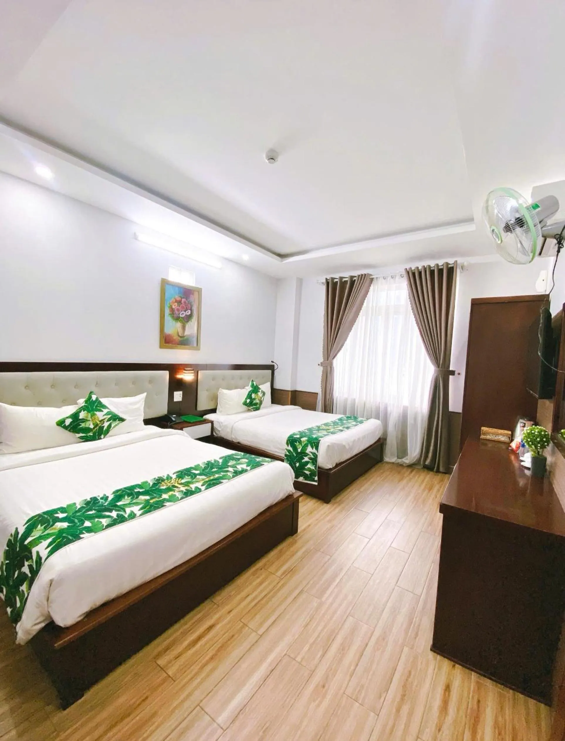 Bed in Flora Quy Nhon Hotel