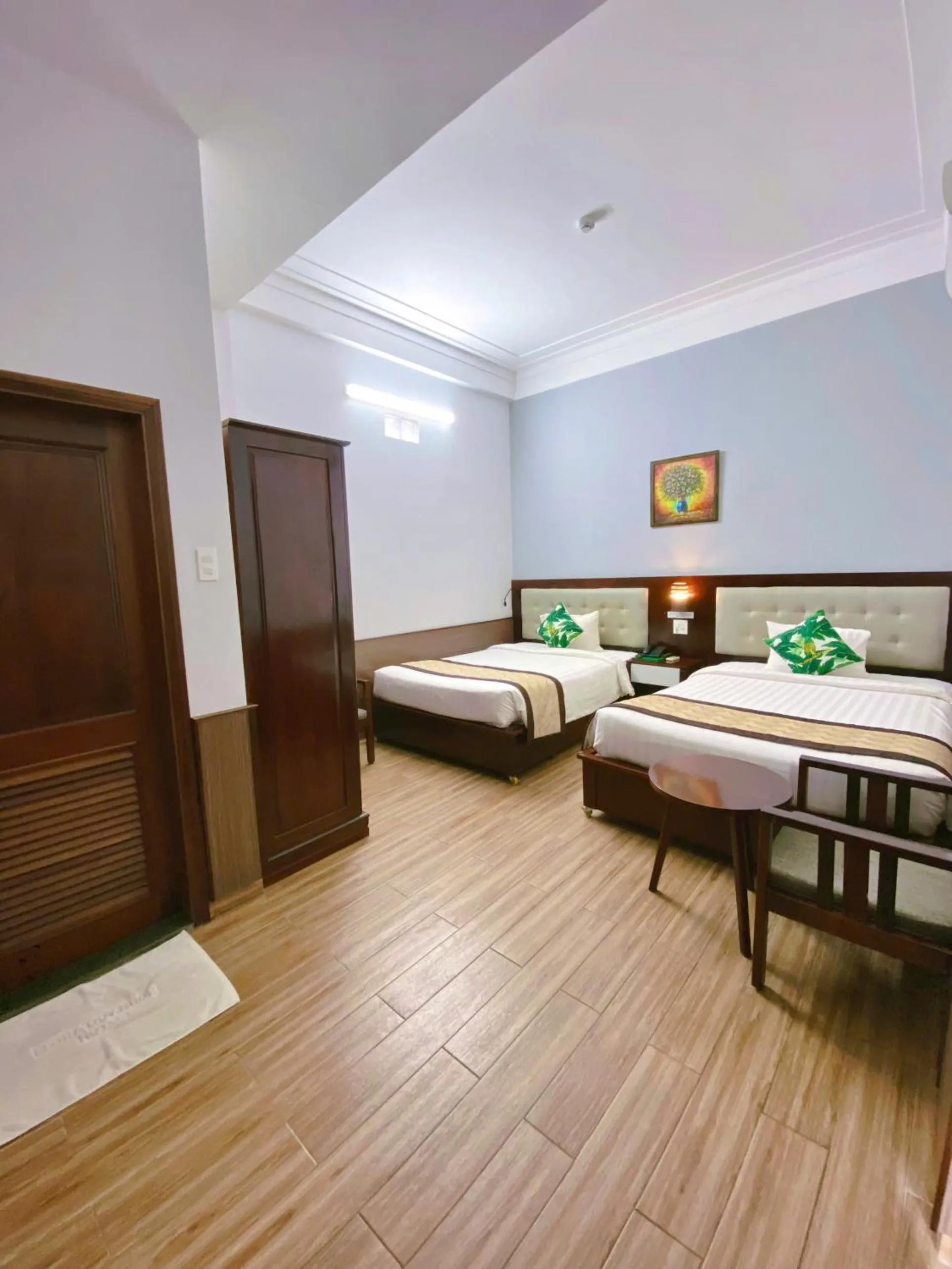 Bed in Flora Quy Nhon Hotel