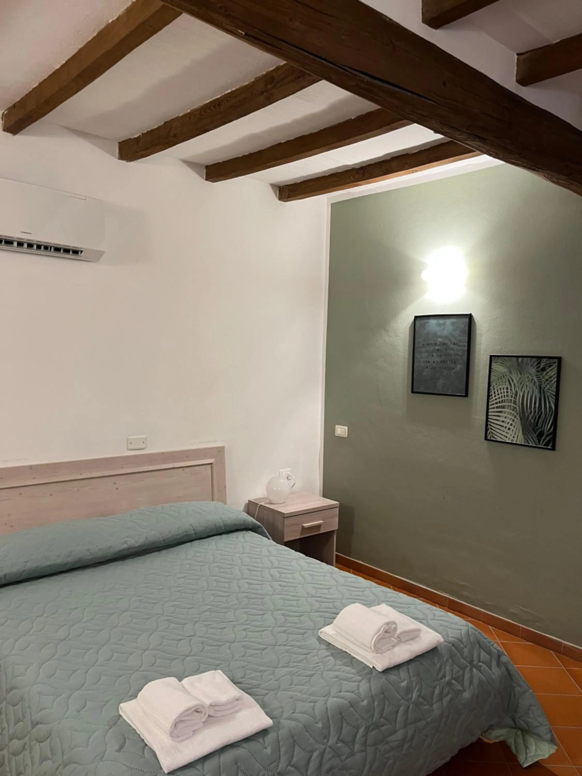 Photo of the whole room, Bed in Villaggio Della Salute Più