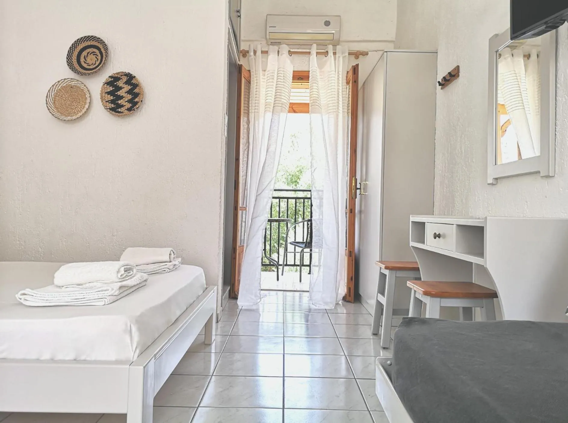 Bed in Emilia Apartments