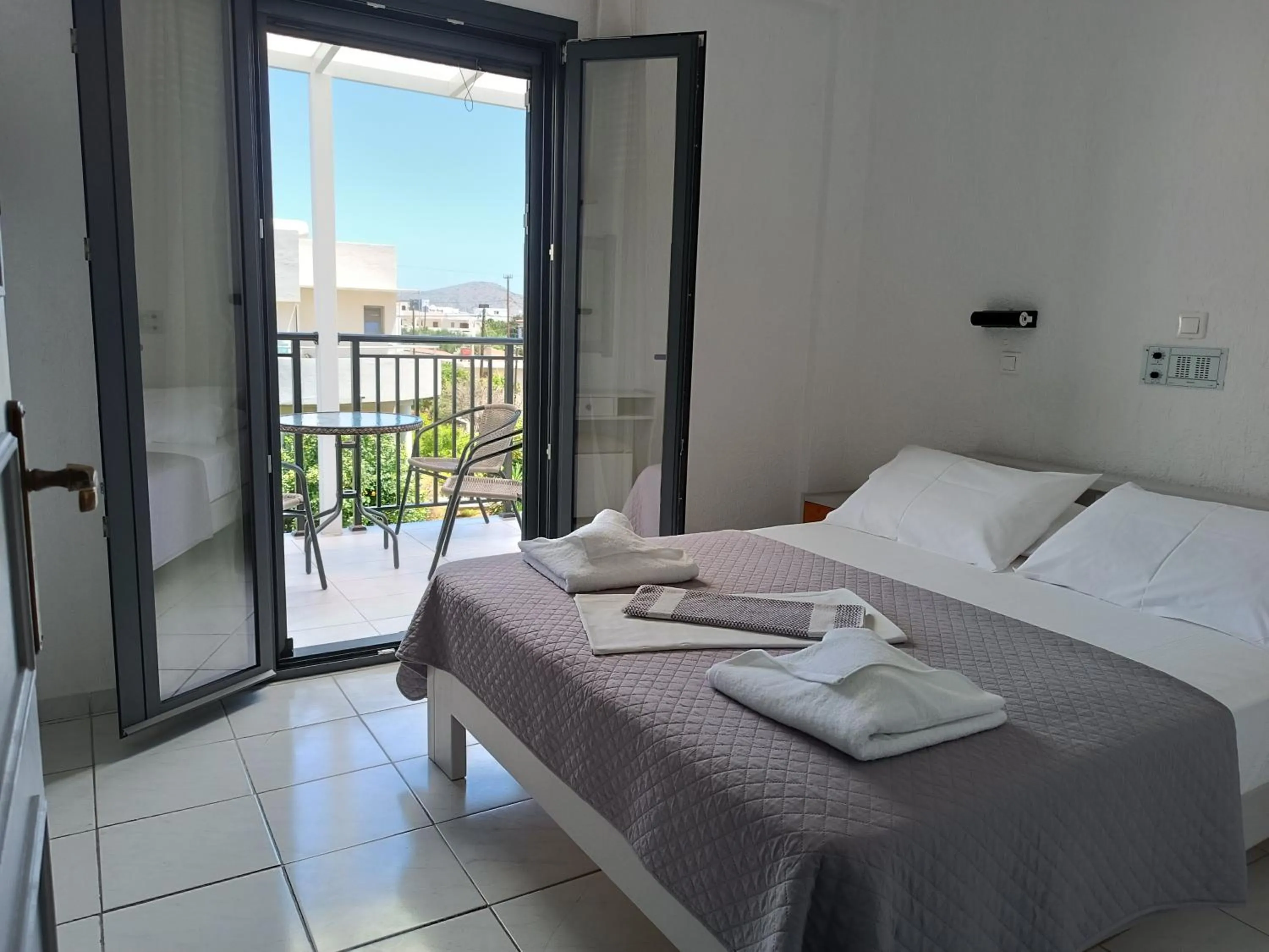 Bed in Emilia Apartments