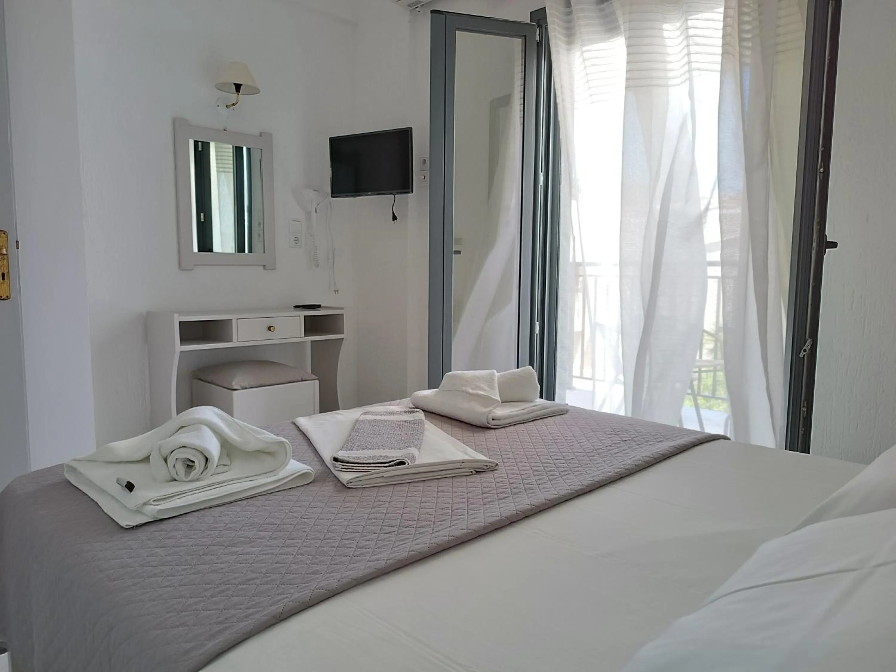 Bedroom, Bed in Emilia Apartments