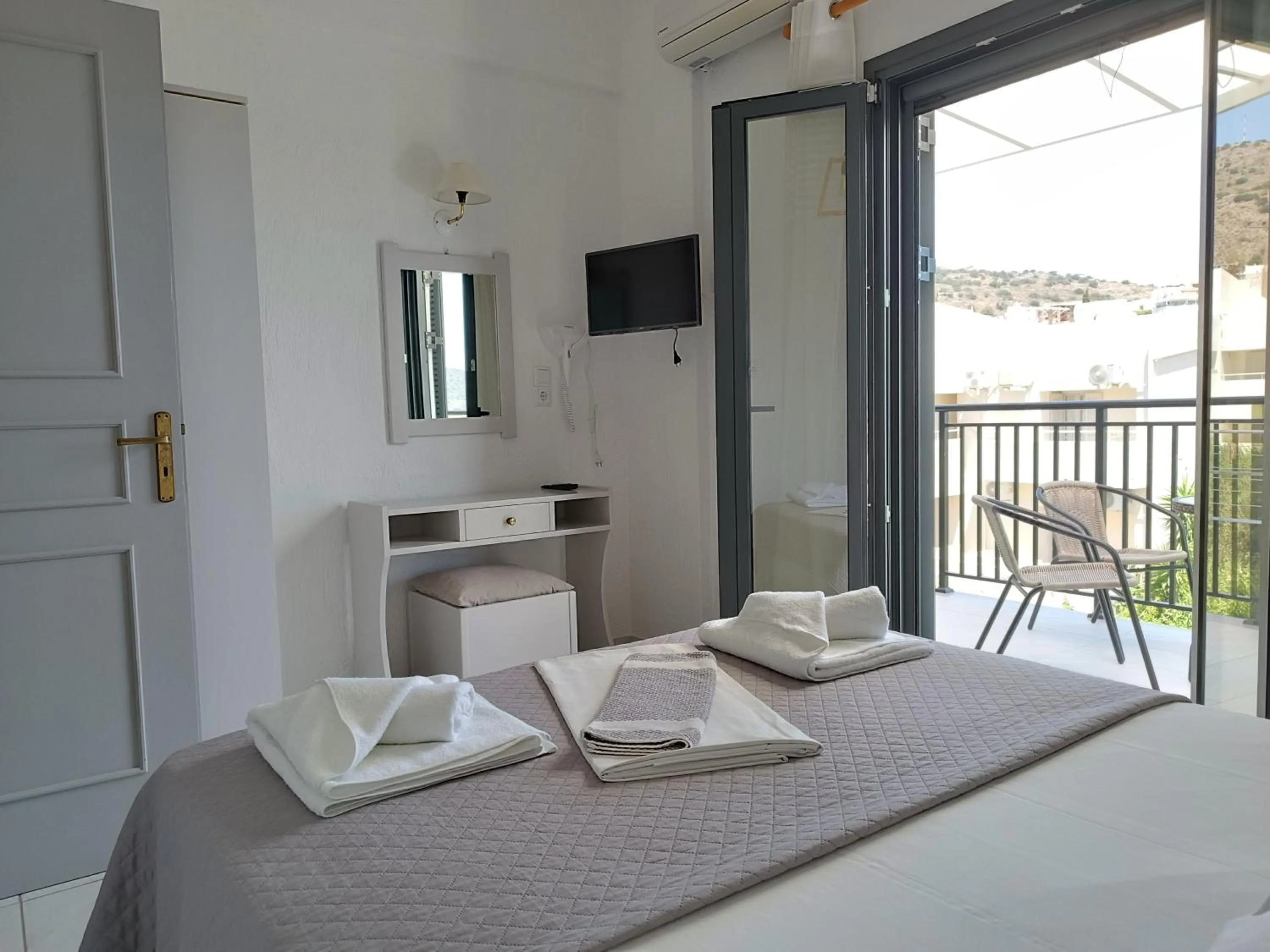 Bed in Emilia Apartments