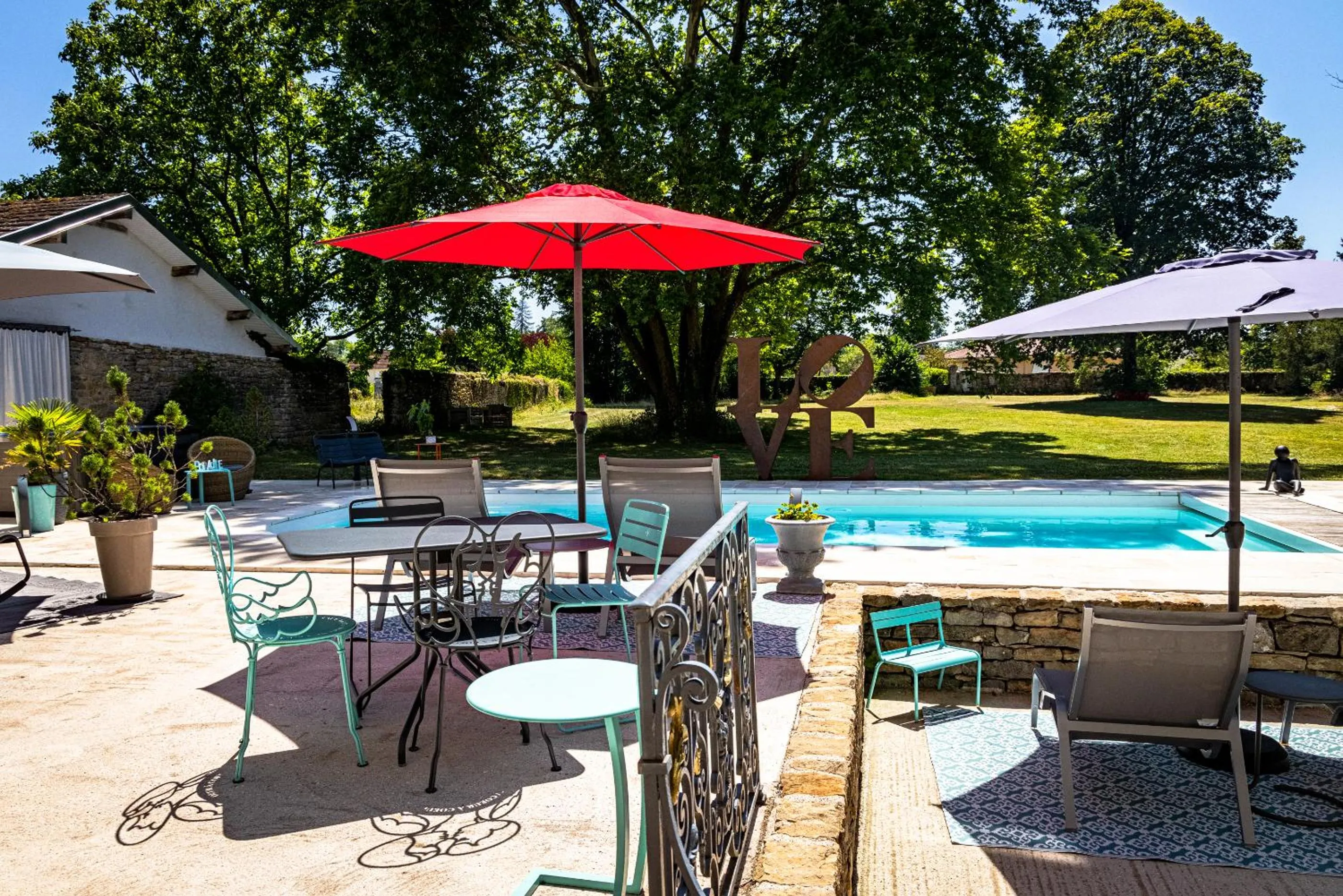 Garden in Le 49 Côté Parc & SPA