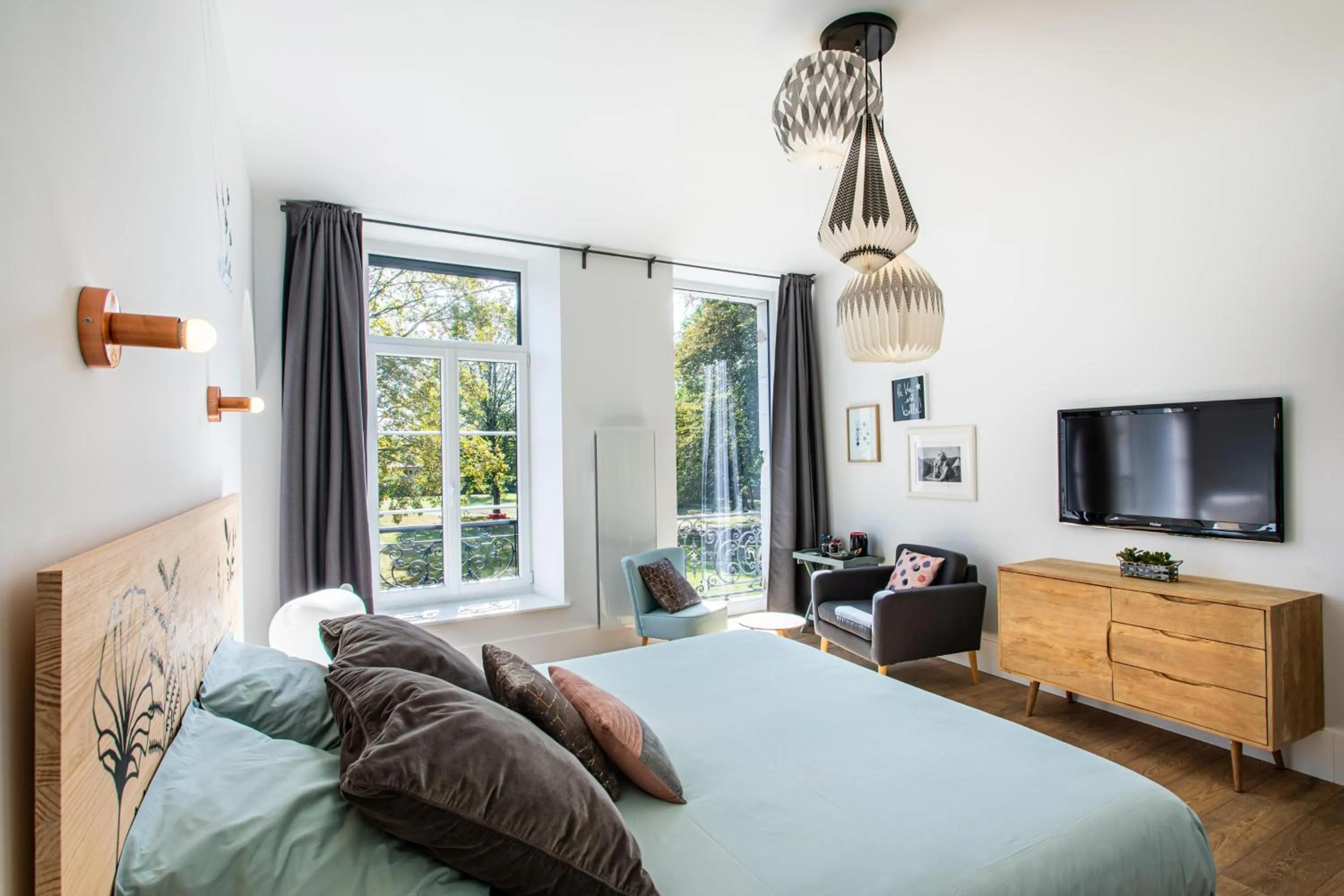 Bed in Le 49 Côté Parc & SPA