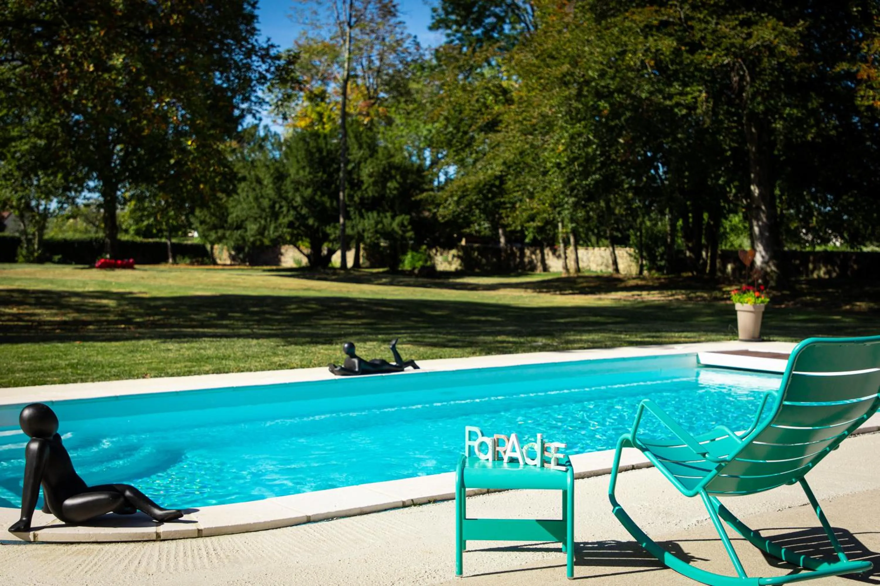 Pool view in Le 49 Côté Parc & SPA