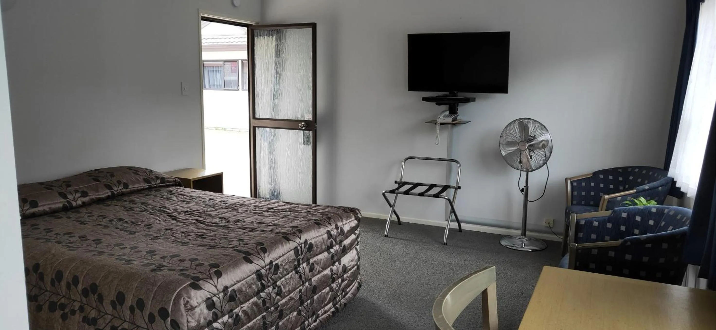 Bed in Cypress Court Motel