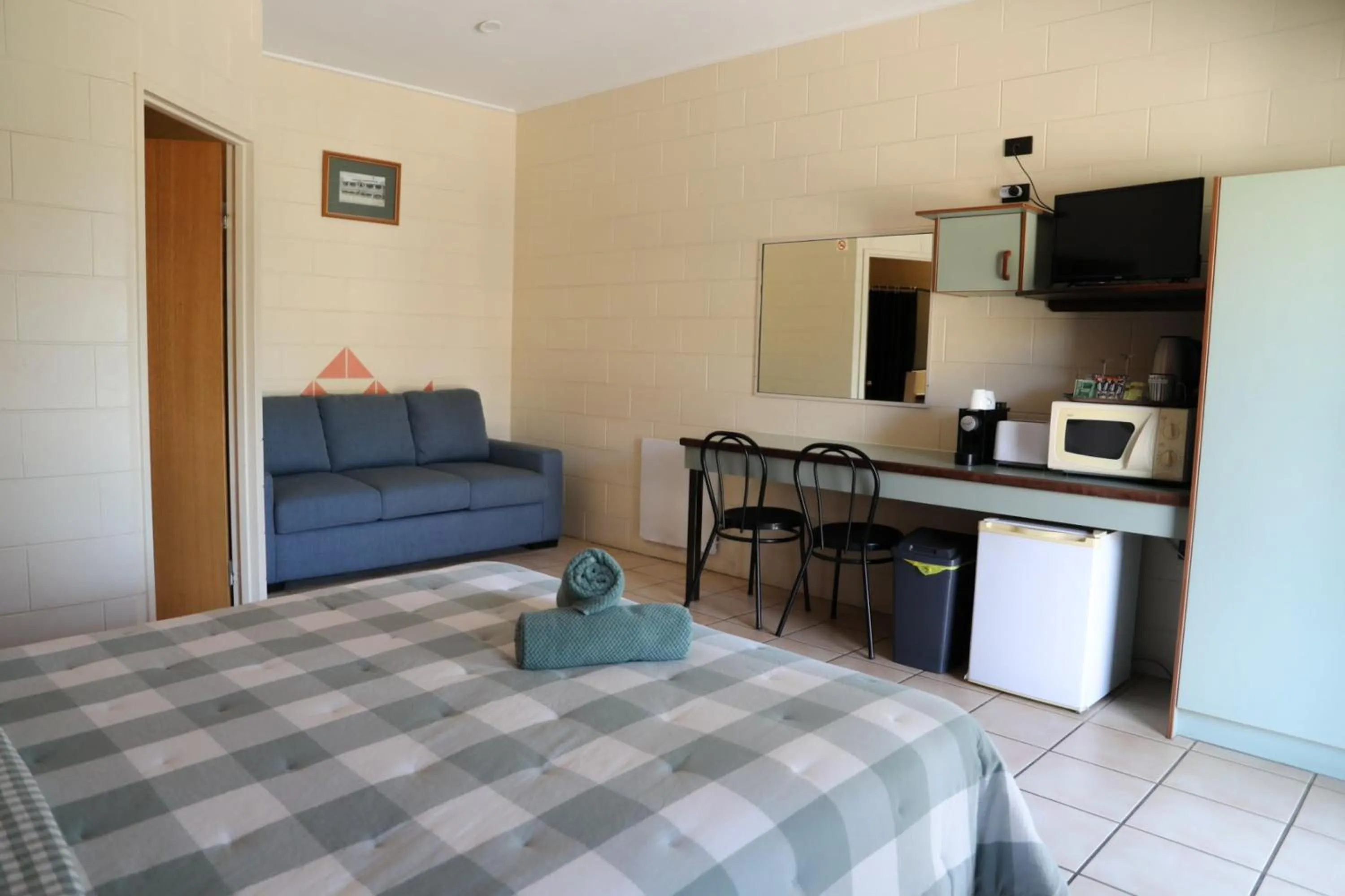 Bed in Curtain Fig Motel