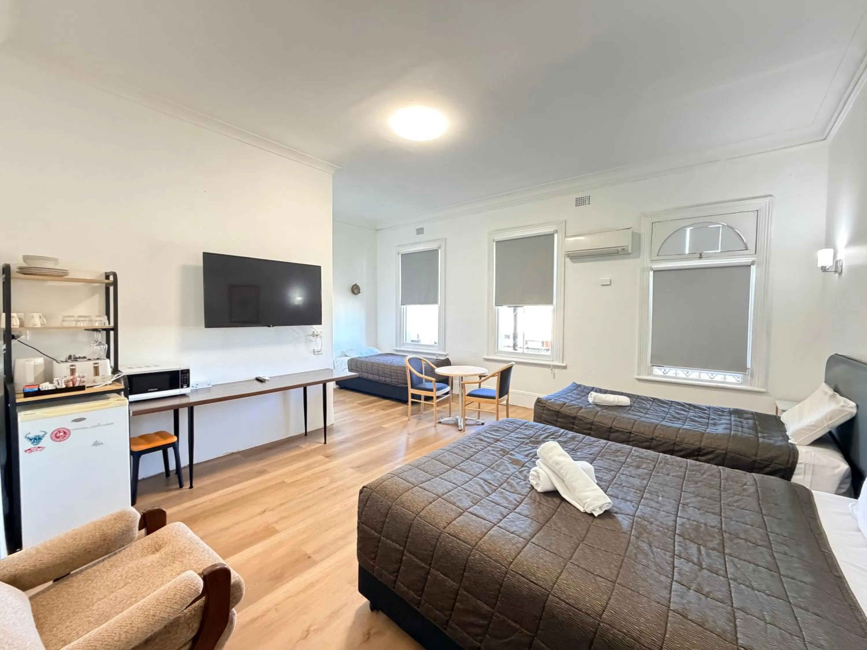 Bed in Alpine Heritage Motel