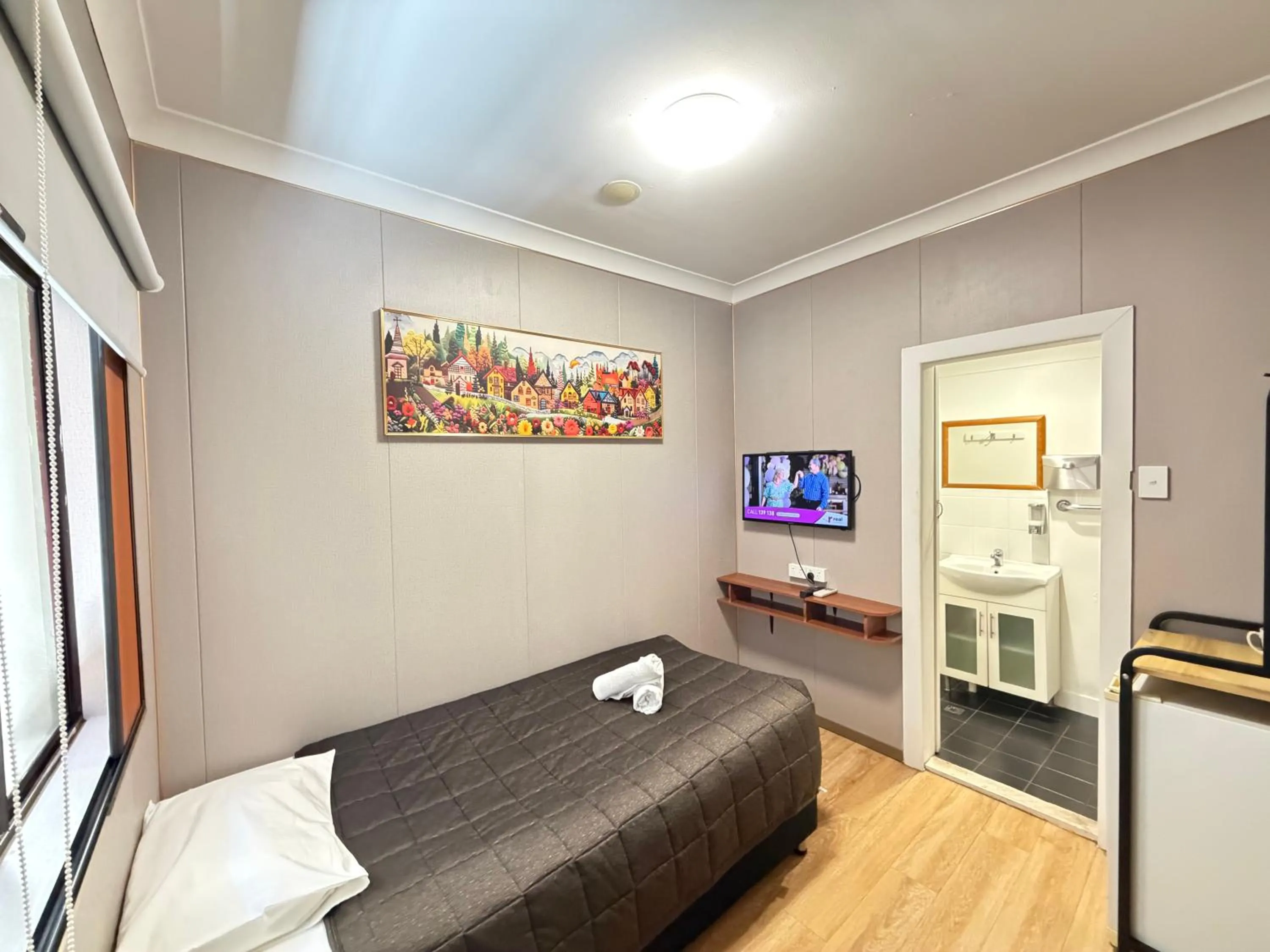 Bed in Alpine Heritage Motel