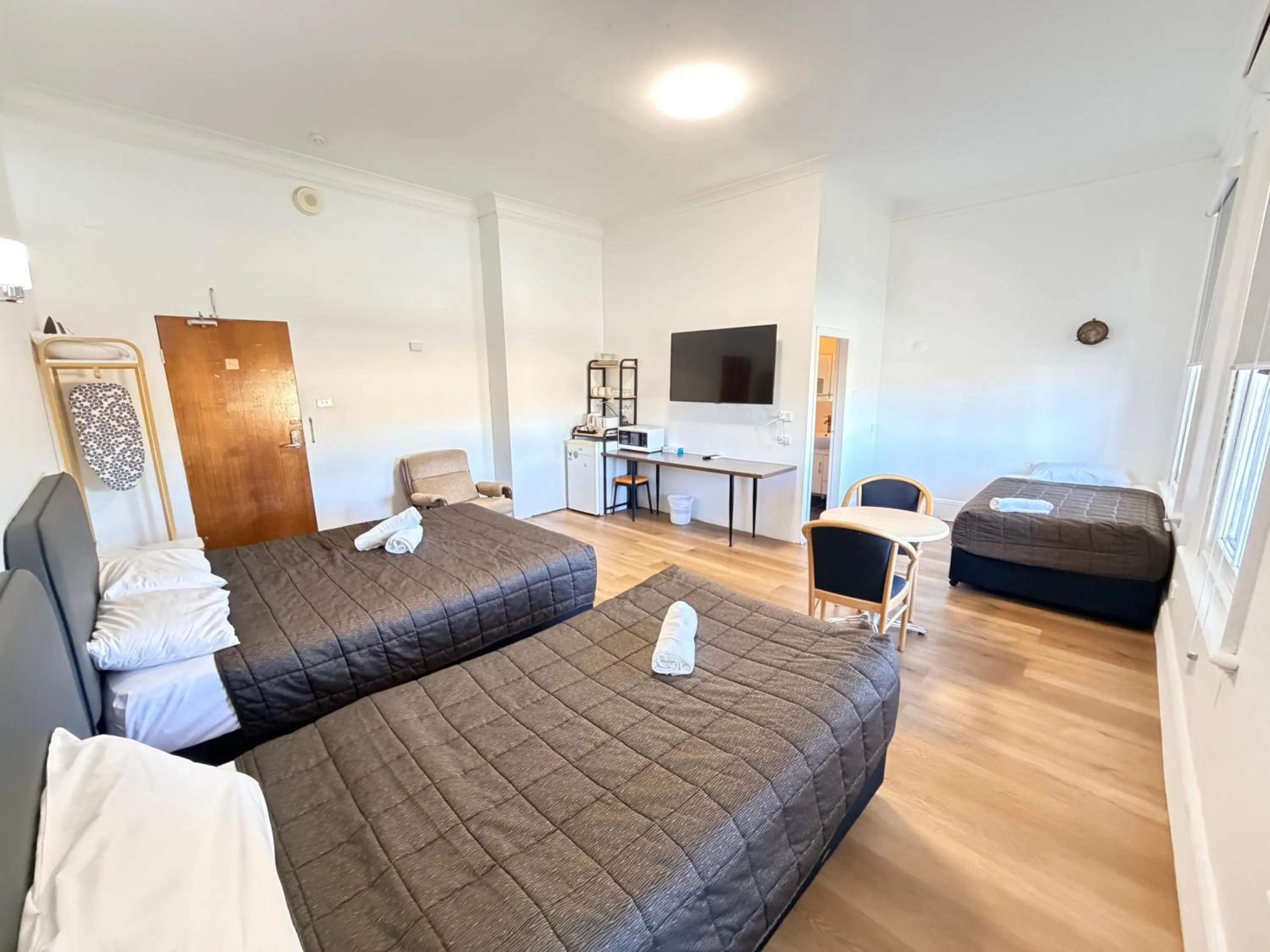 Bed in Alpine Heritage Motel