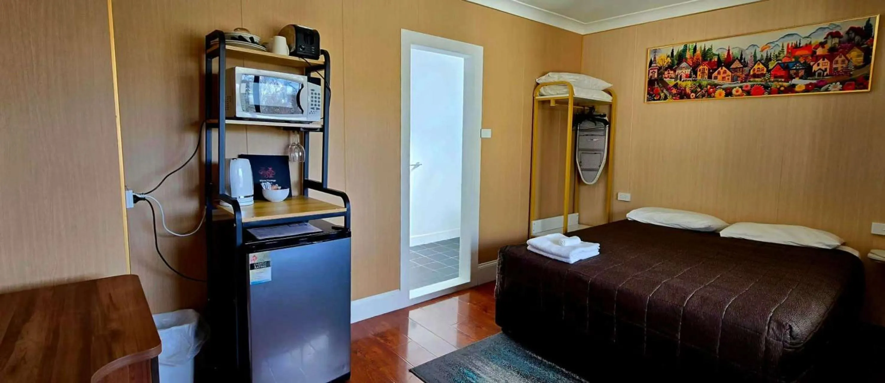 Bed in Alpine Heritage Motel