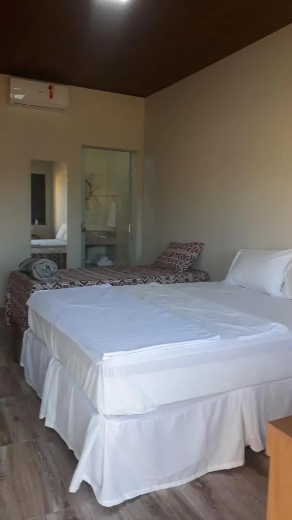 Bed in TuTu TonTo Acomodações e Lazer