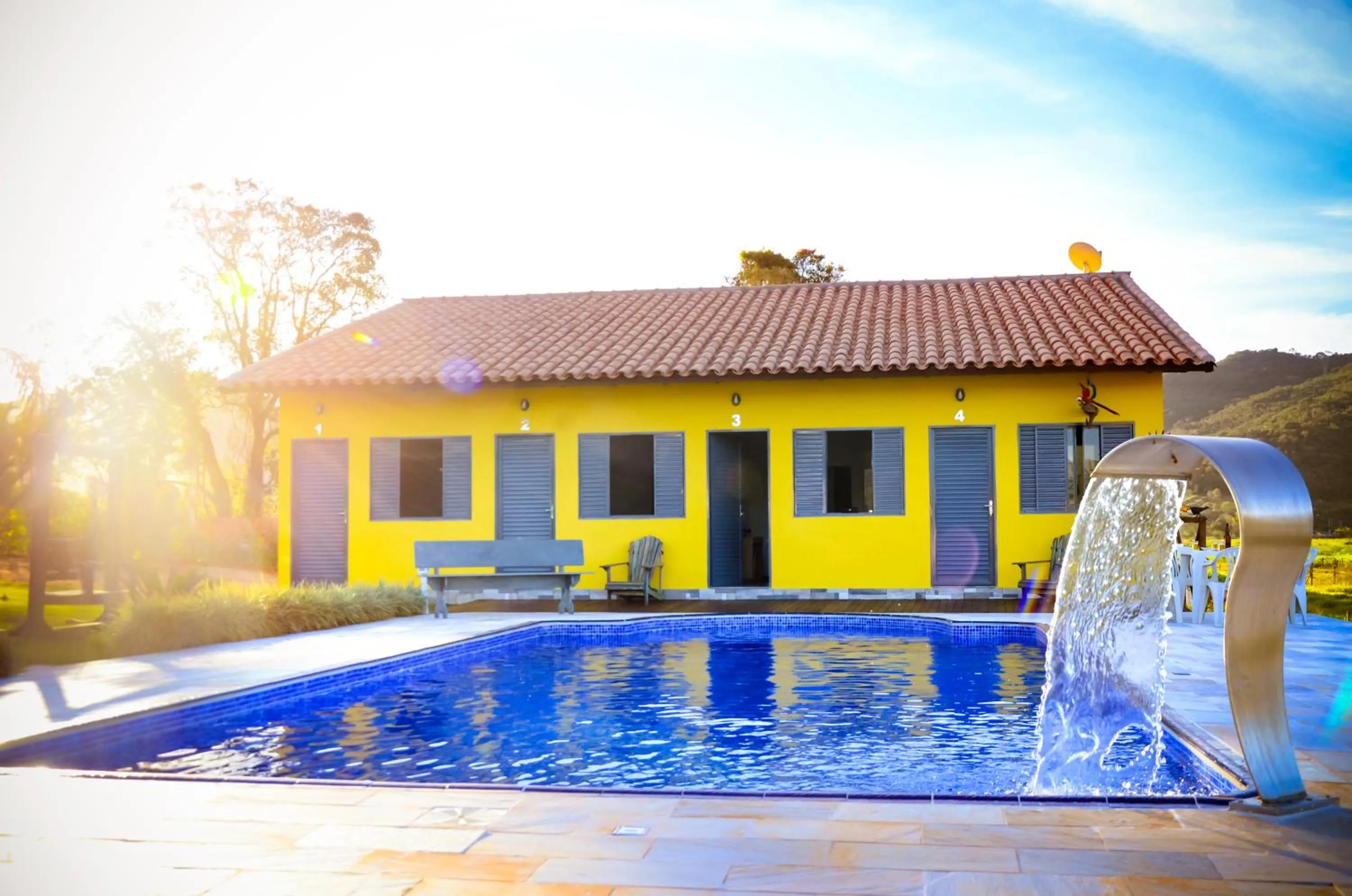 Swimming pool in TuTu TonTo Acomodações e Lazer