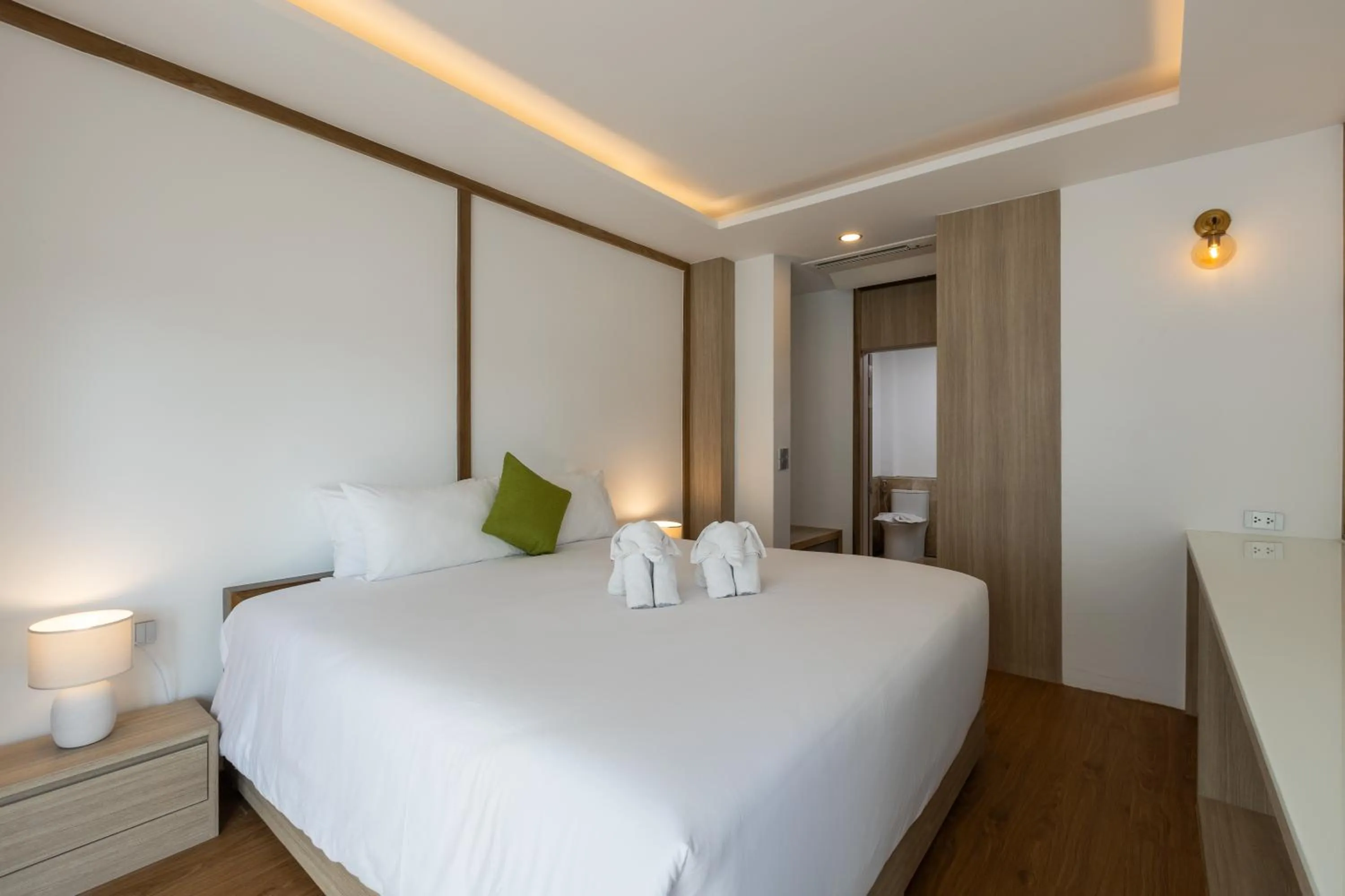 Bed in Phunawa Resort Phuket Karon Beach - SHA Plus