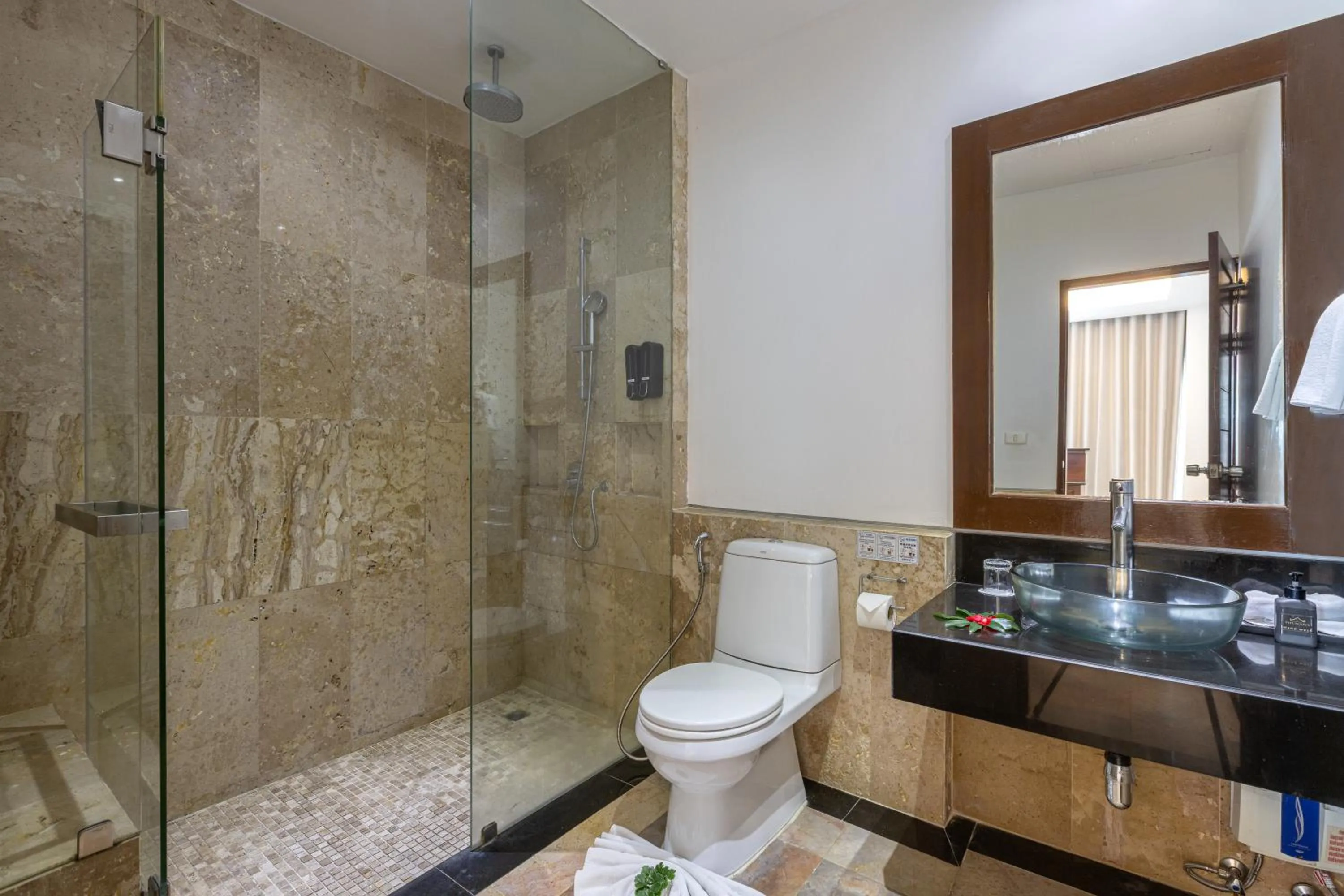 Bathroom in Phunawa Resort Phuket Karon Beach - SHA Plus