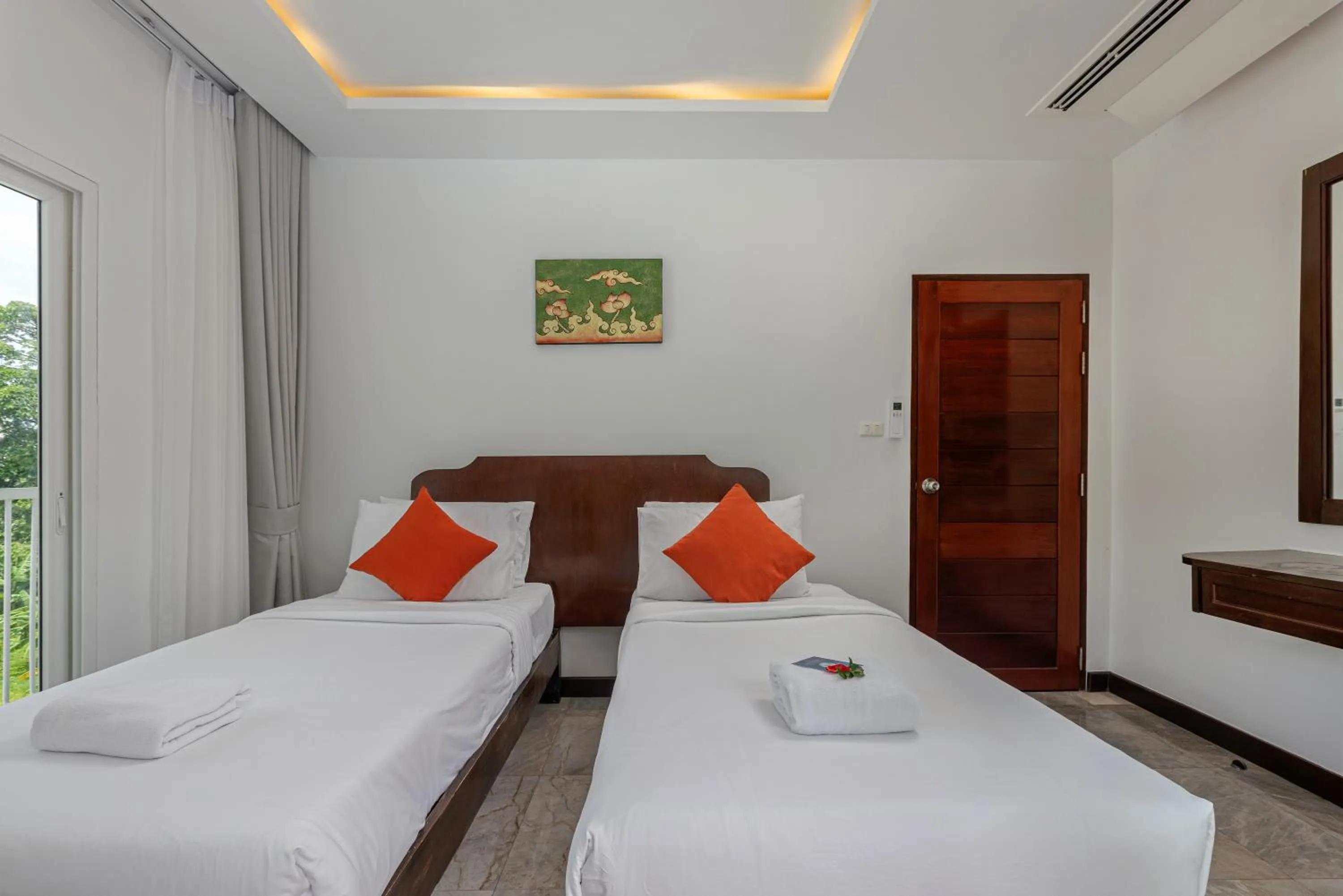 Bed in Phunawa Resort Phuket Karon Beach - SHA Plus