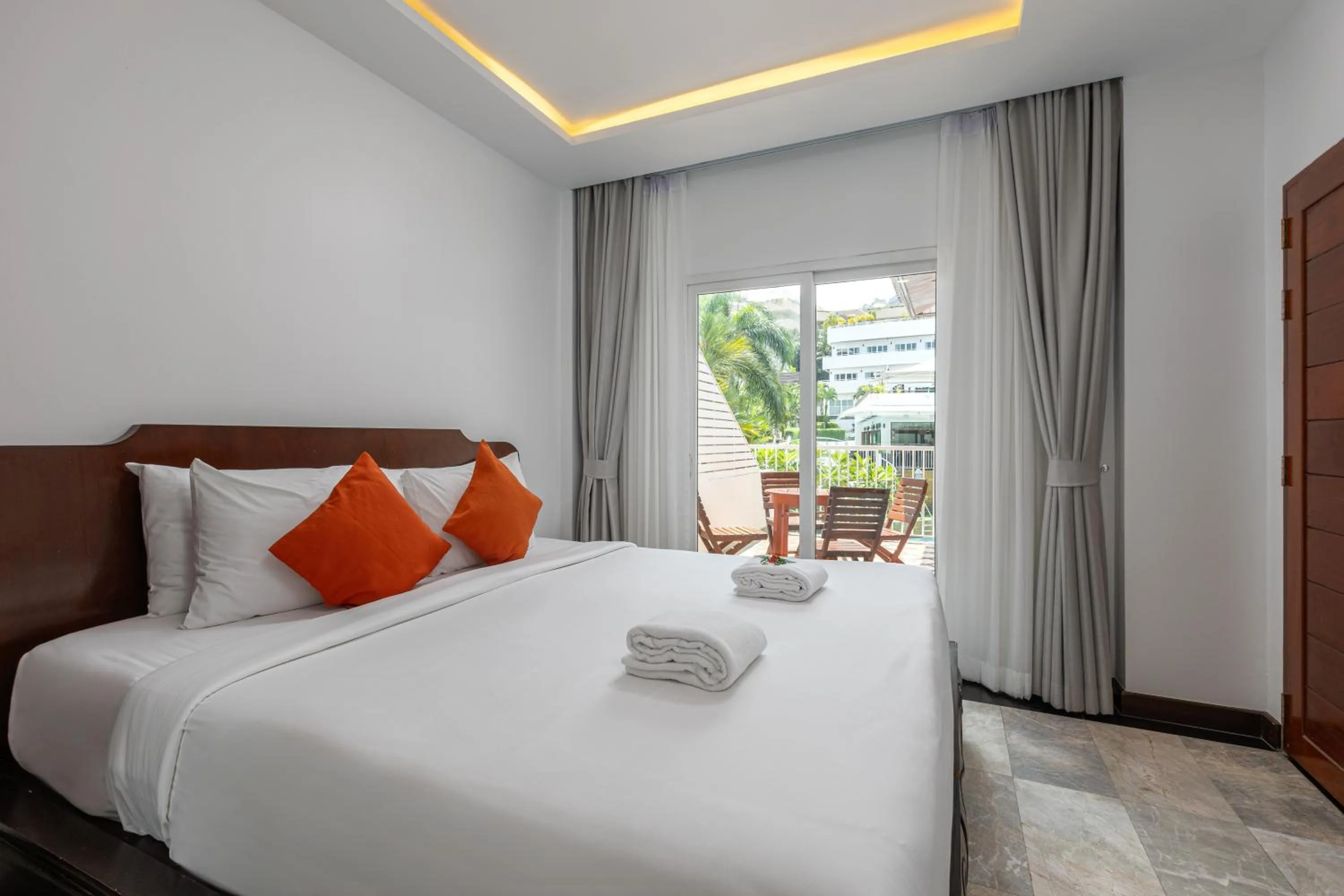 Bed in Phunawa Resort Phuket Karon Beach - SHA Plus