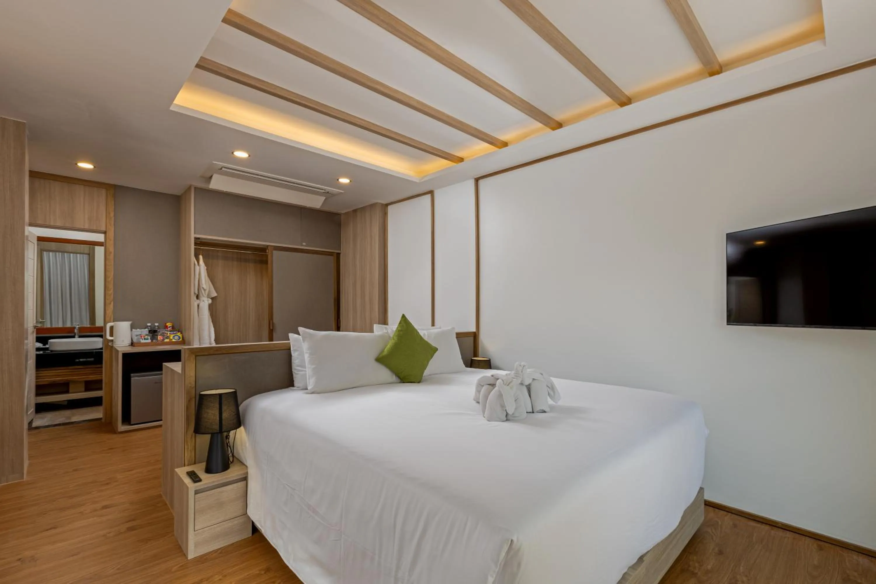 Bed in Phunawa Resort Phuket Karon Beach - SHA Plus