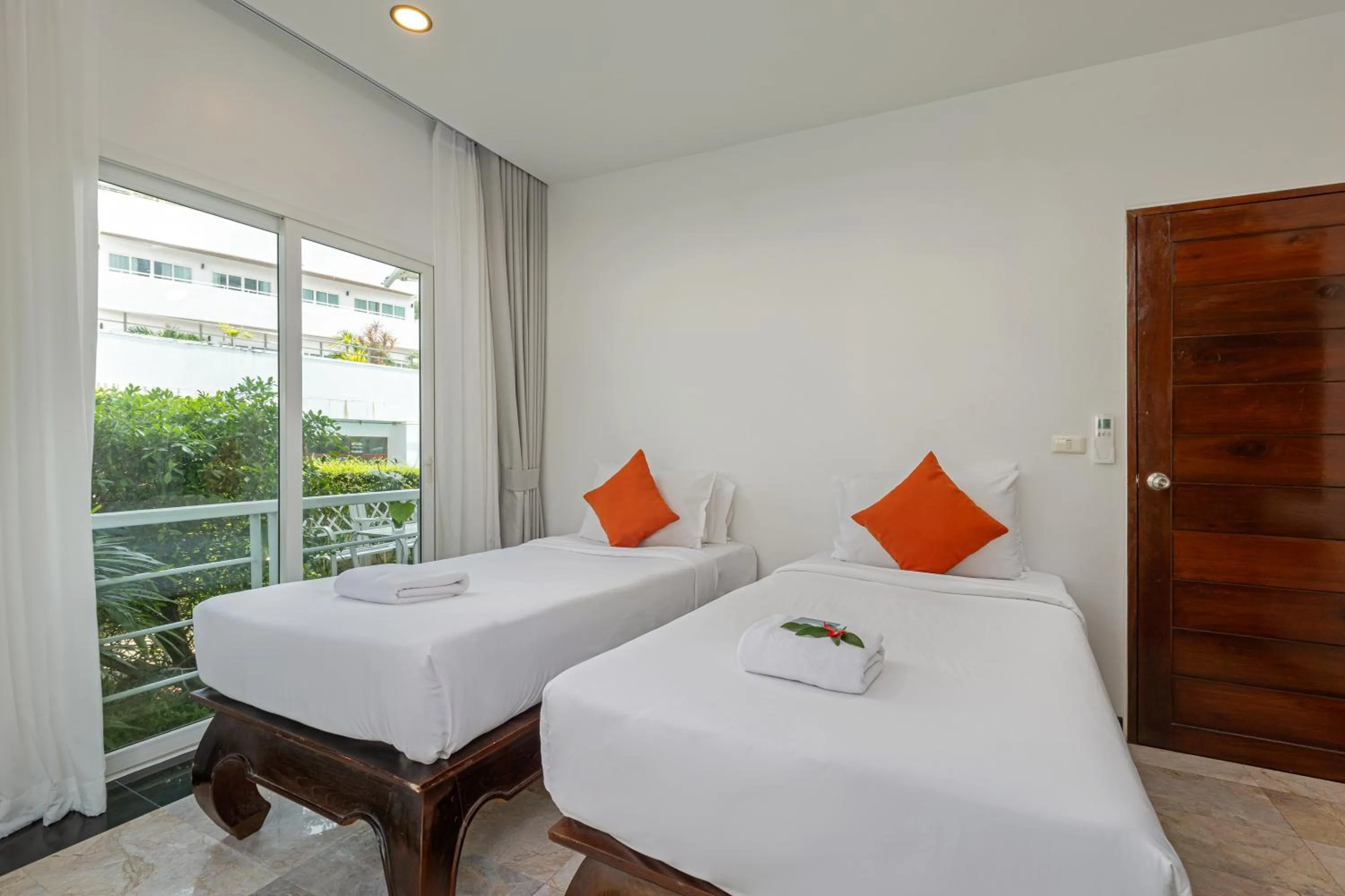 Bed in Phunawa Resort Phuket Karon Beach - SHA Plus