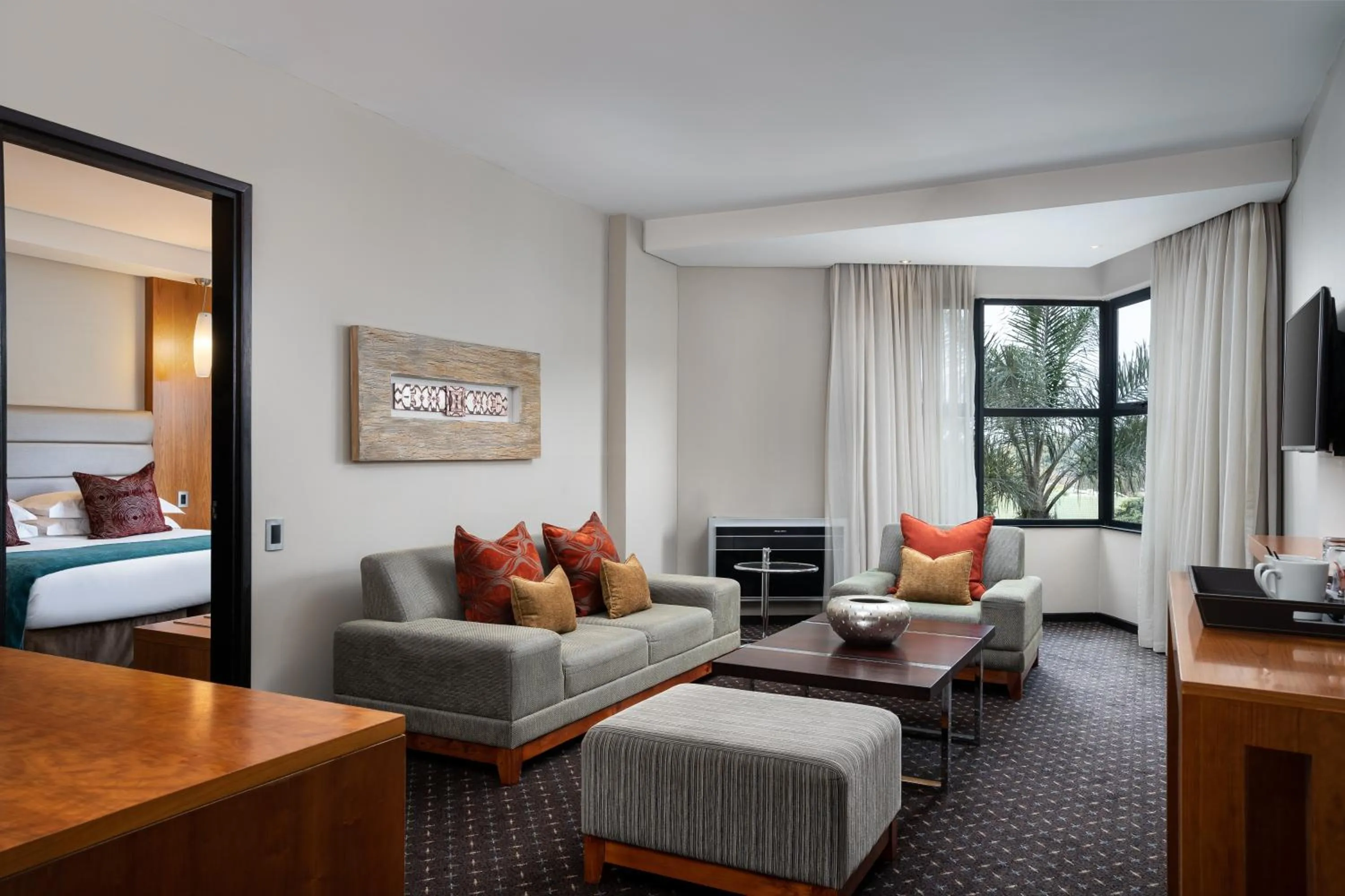 Seating area, Bed in Premier Hotel O.R. Tambo