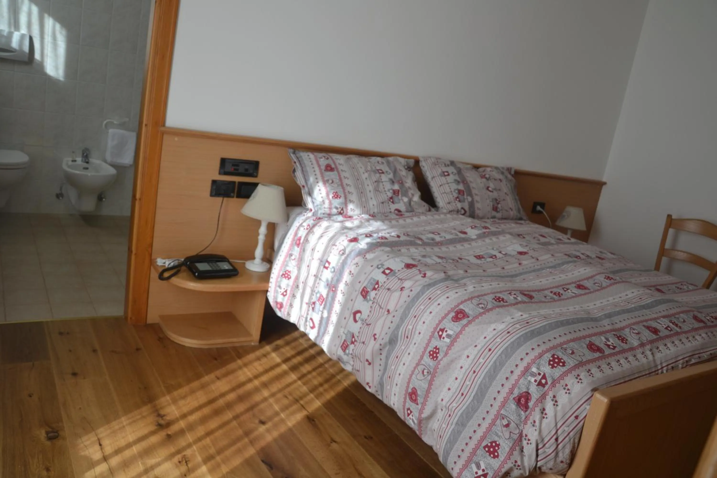 Bed in Meublè Rosalpina