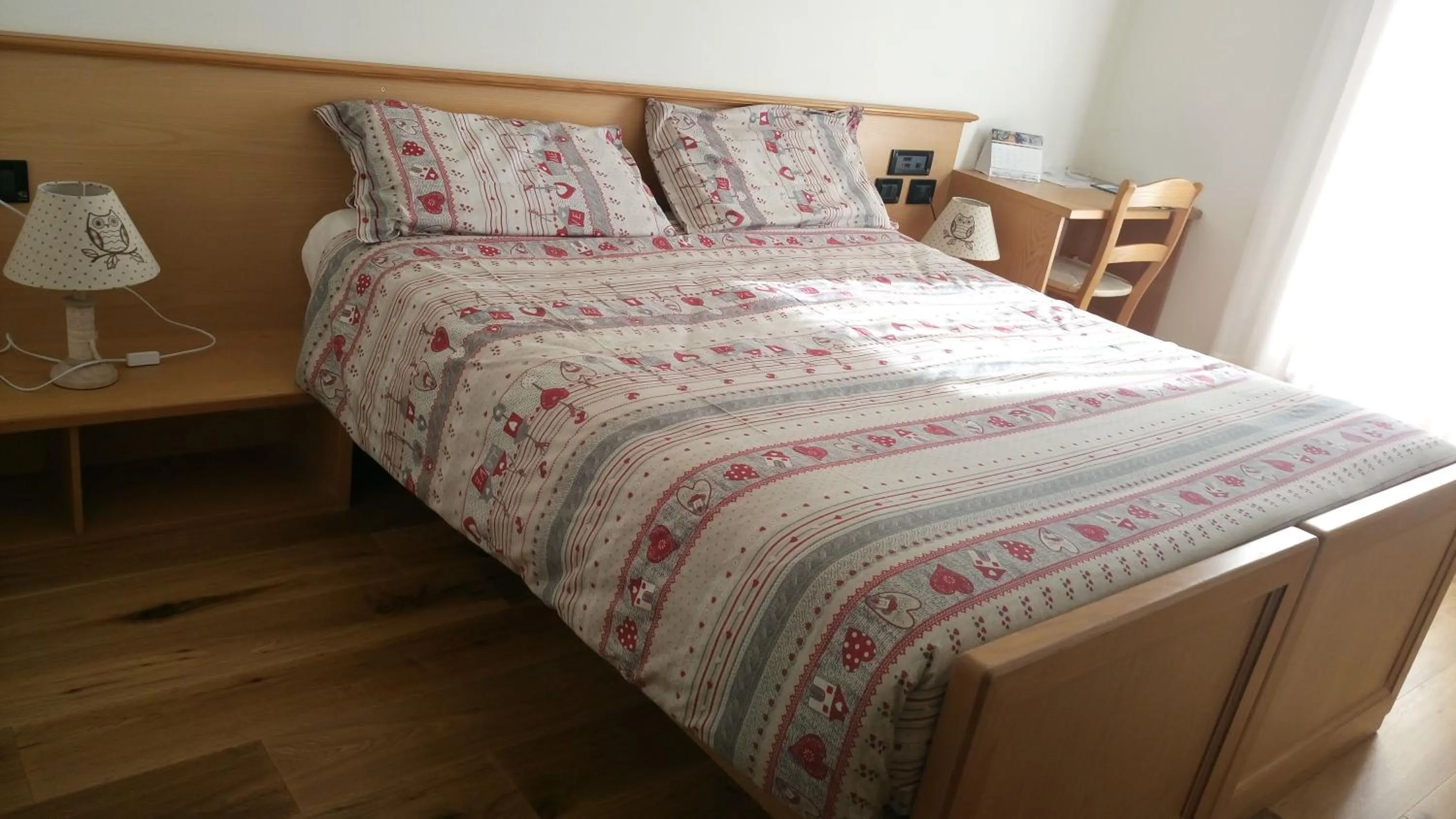 Bed in Meublè Rosalpina