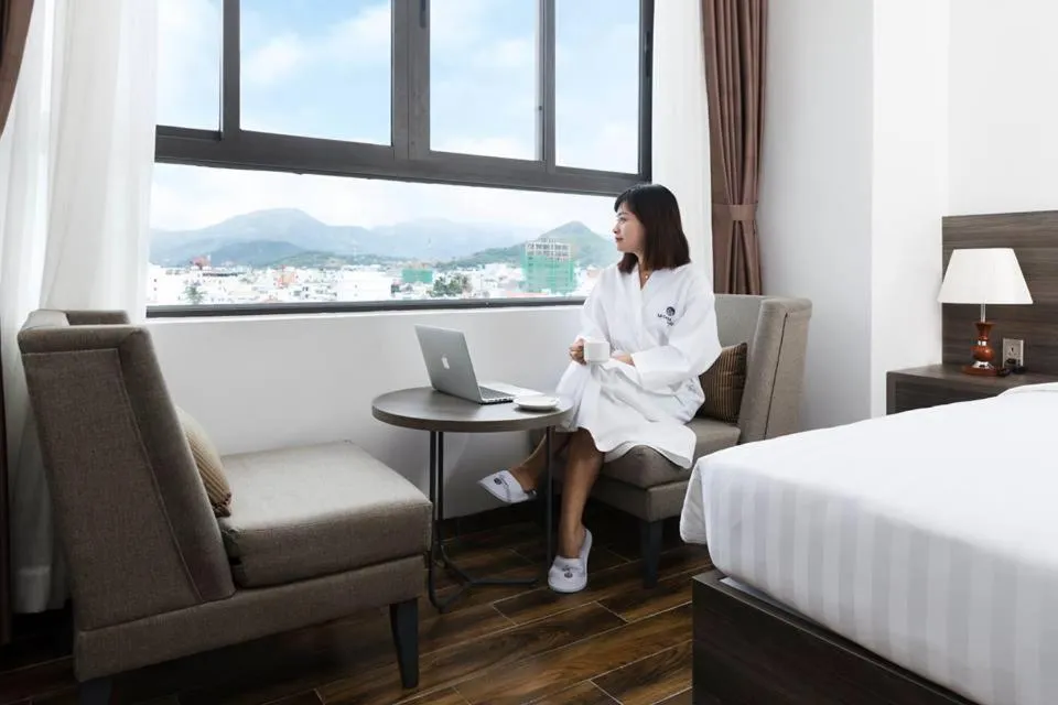 Bed in La Casa Hotel Nha Trang