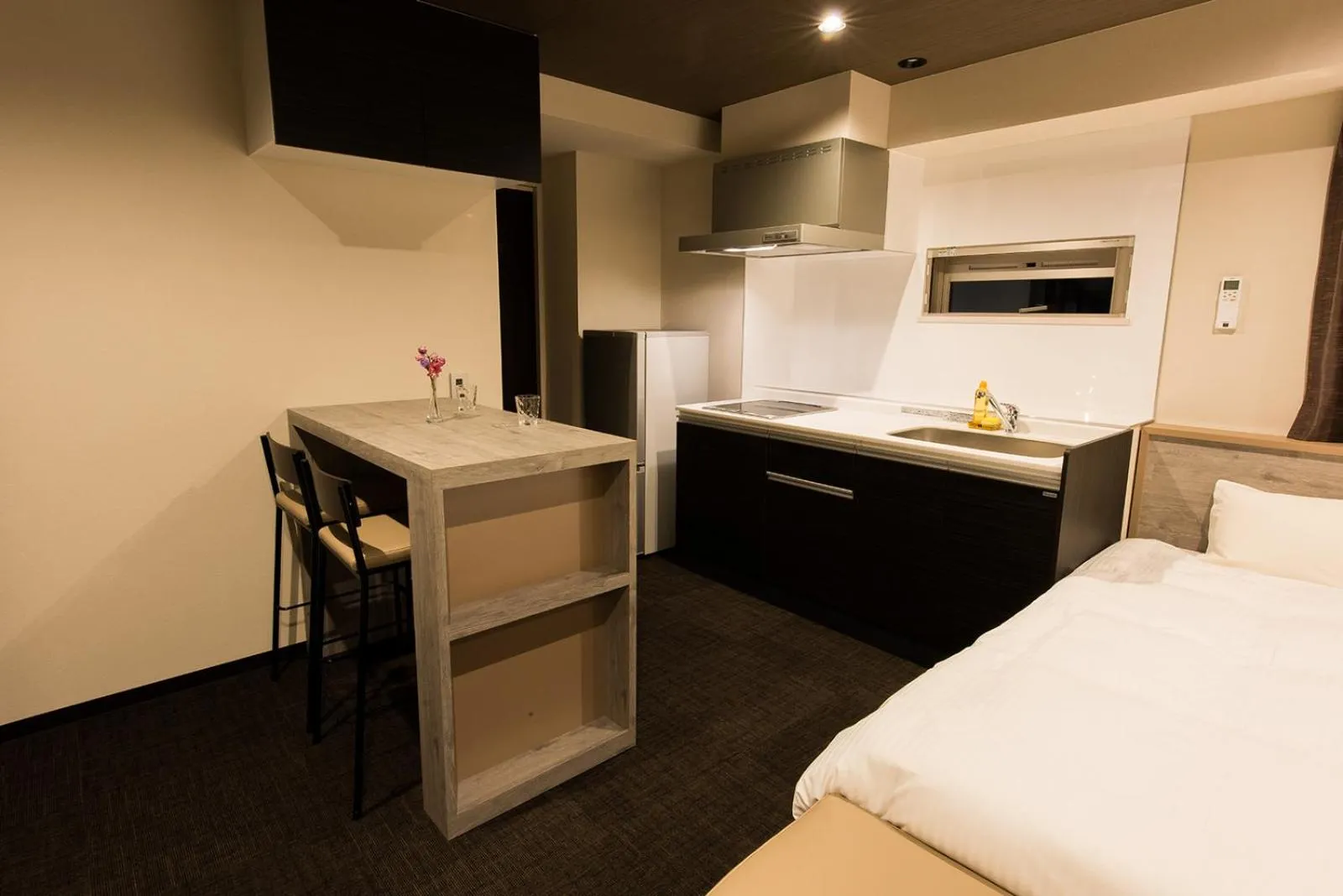 Kitchen or kitchenette, Bed in INOVA Kanazawa