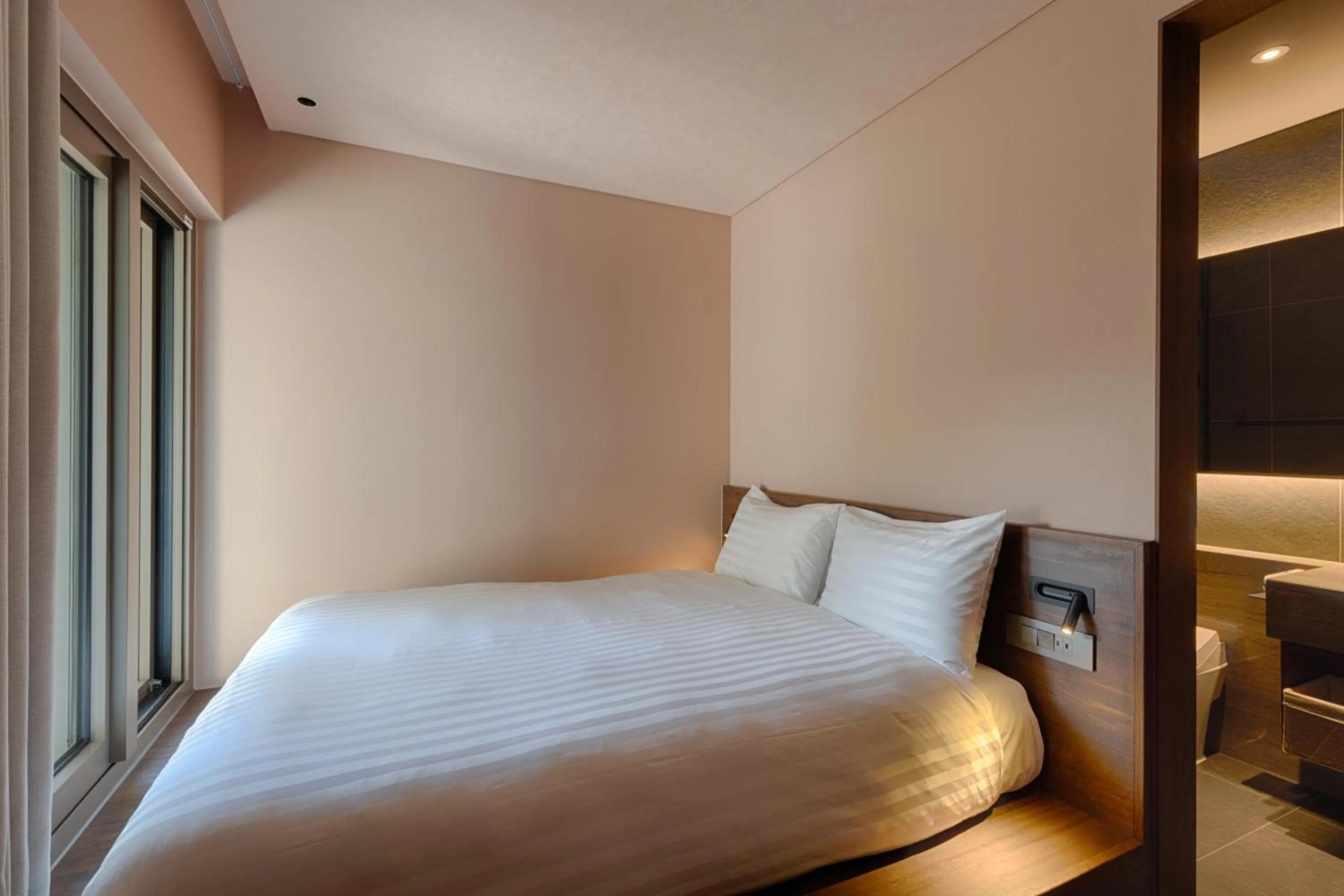 Bed in Sono Calm Jeju