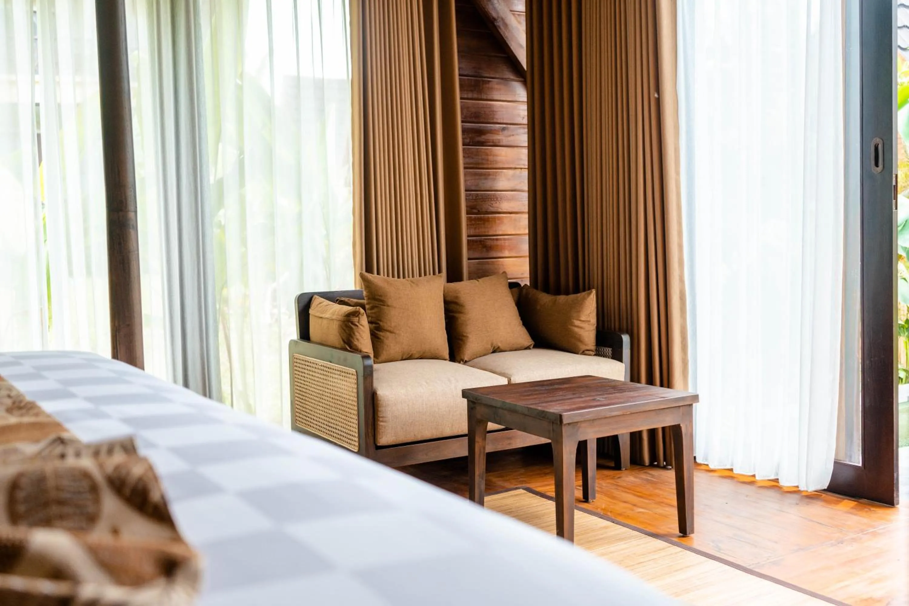 Seating area, Bed in Wadari Retreat Villa Ubud