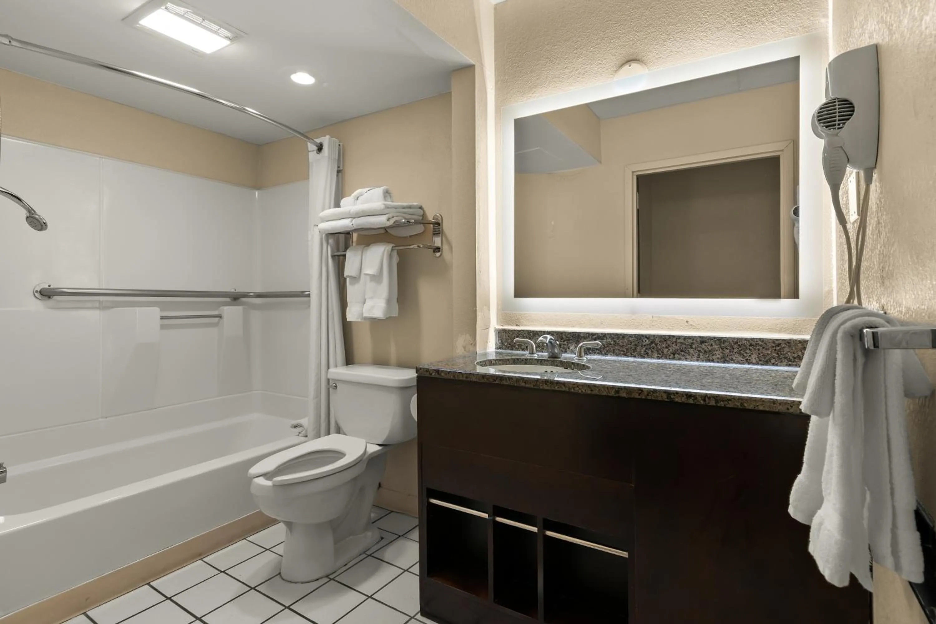 Toilet in Ramada by Wyndham Harrisburg/Hershey Area