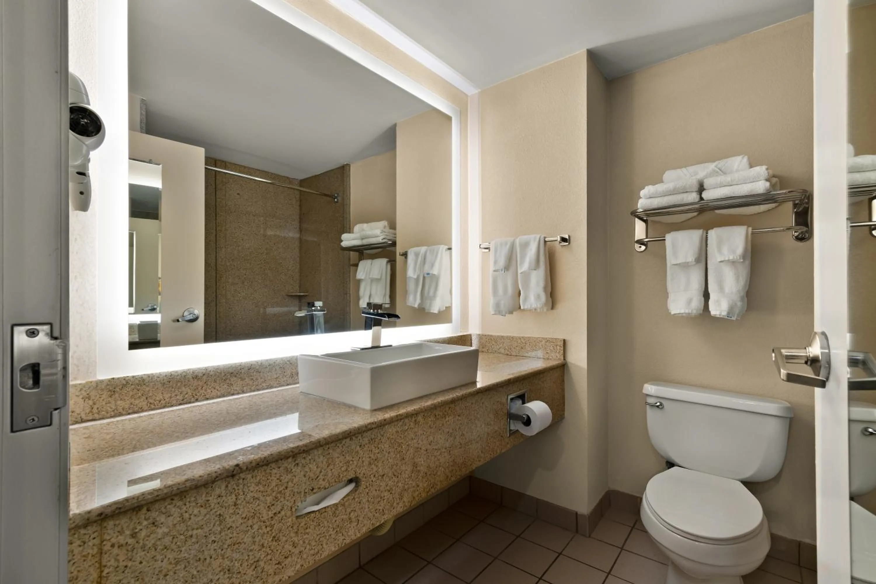 Toilet in Ramada by Wyndham Harrisburg/Hershey Area